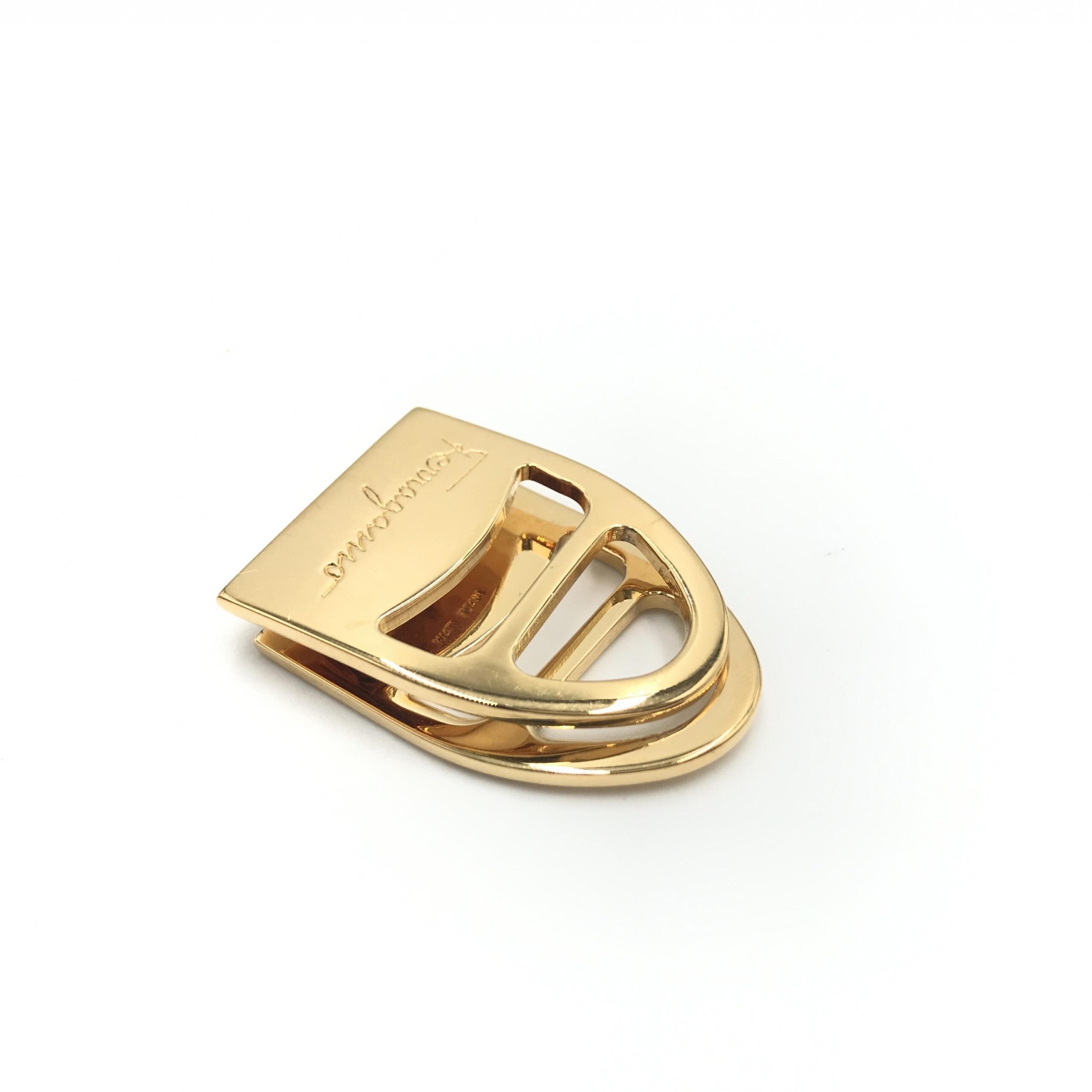 Elevate your style with the Salvatore Ferragamo Vara Metal Scarf Ring, a symbol of timeless elegance and exquisite Italian craftsmanship, perfect for any sophisticated ensemble.