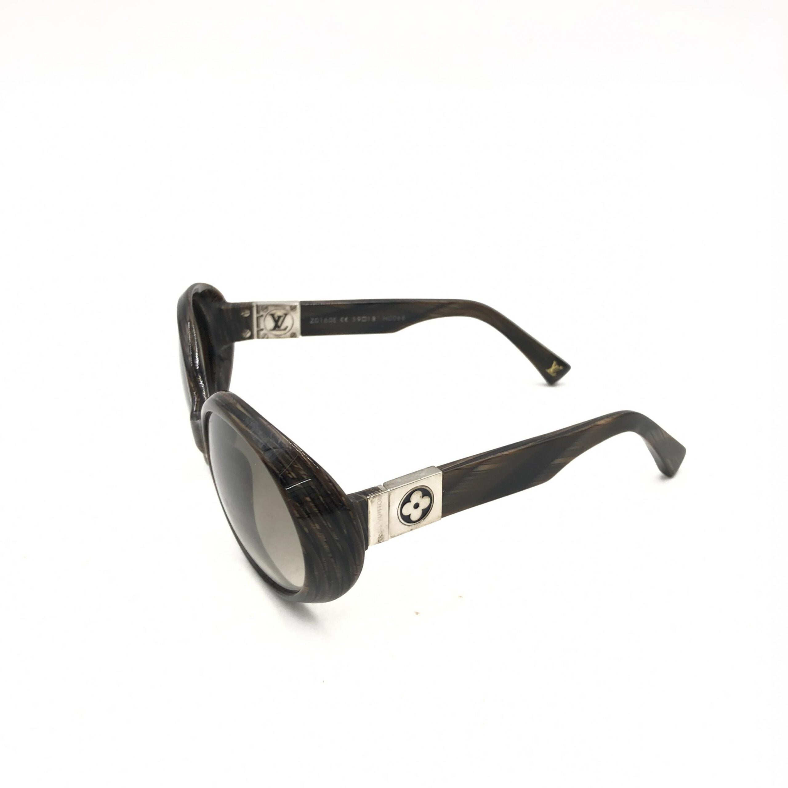 Elevate your style with Louis Vuitton's Suspense BugEye Sunglasses, featuring polarized lenses and exquisite craftsmanship for a sophisticated, timeless allure.