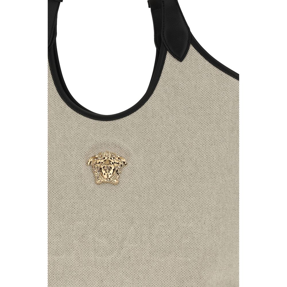 Elevate your elegance with the Versace Beige Cotton Shoulder Bag, a timeless luxury piece from the SS26 collection, crafted for the discerning connoisseur.