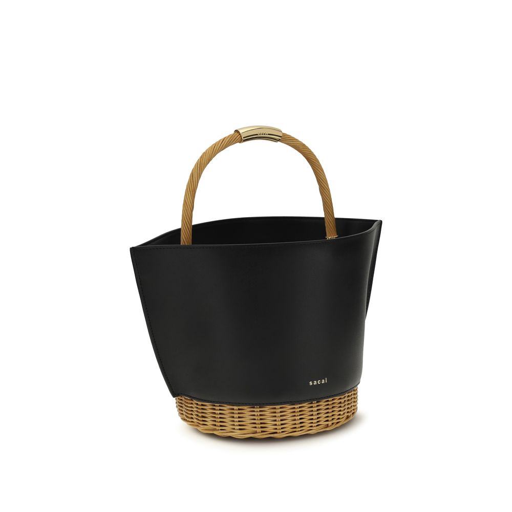 Discover the Sacai Black Calf Leather Bos Taurus Shoulder Bag, an exquisite blend of raffia and leather, embodying timeless elegance and versatile luxury for the discerning individual.
