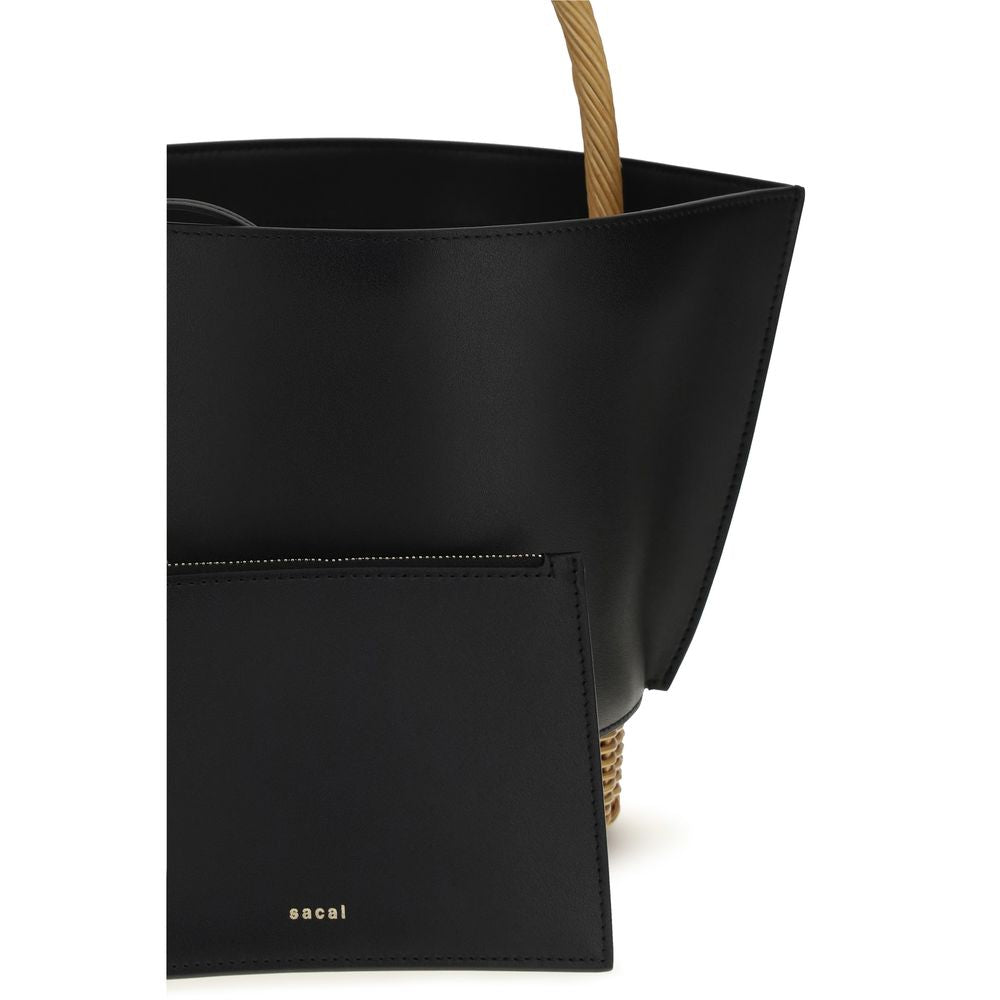 Experience the allure of the Sacai Black Calf Leather Bos Taurus Shoulder Bag, a timeless blend of exquisite craftsmanship and luxurious materials, perfect for any sophisticated occasion.