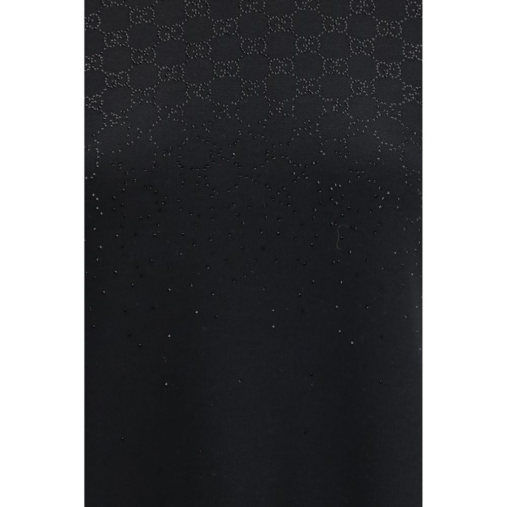 Indulge in the exquisite allure of the Gucci Black Wool Casual Dress, a luxurious blend of wool and viscose, embodying timeless elegance and sophisticated craftsmanship for the discerning individual.