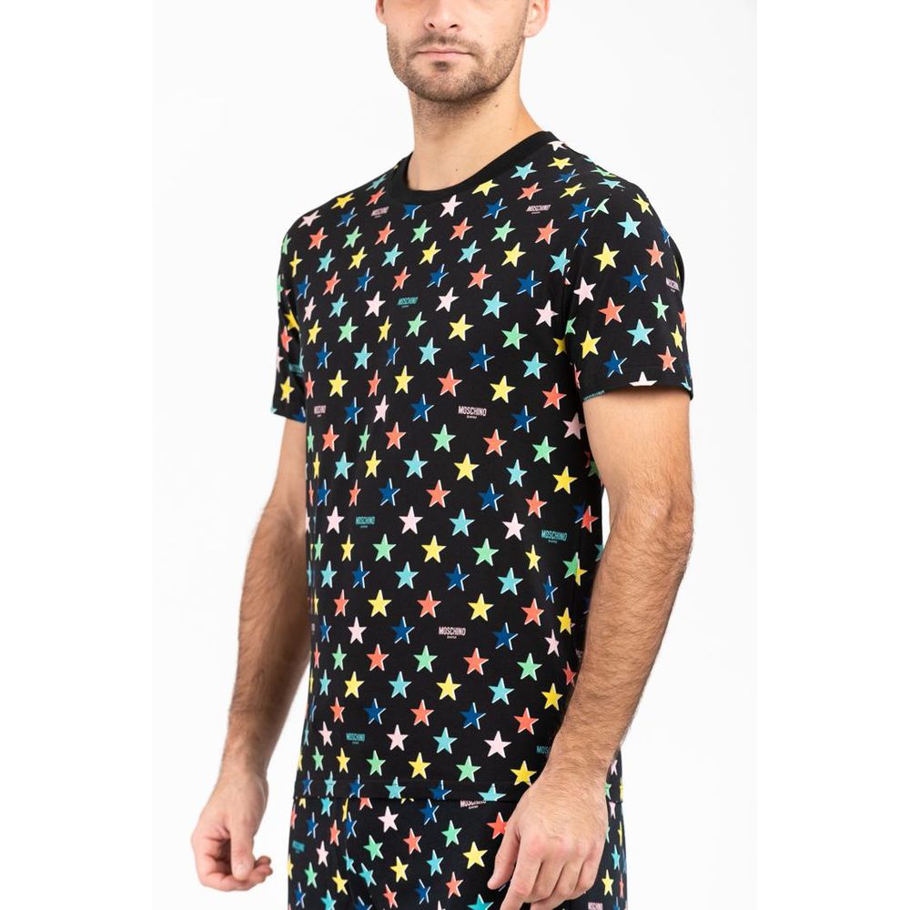 Experience the allure of the Moschino Black Cotton T-Shirt, crafted from luxurious materials for a tailored fit that embodies sophistication and timeless elegance.