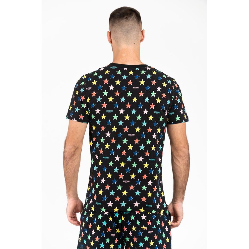 Indulge in the Moschino Black Cotton T-Shirt, a masterpiece of Italian craftsmanship blending luxury and comfort, perfect for elevating any sophisticated wardrobe.