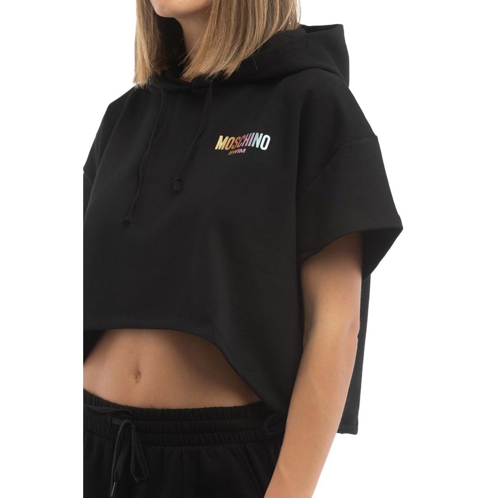 Discover the Moschino Black Cotton Sweatshirt, a luxurious blend of comfort and style, crafted from premium cotton for the modern connoisseur. Elevate your wardrobe with this contemporary piece, perfect for any occasion.