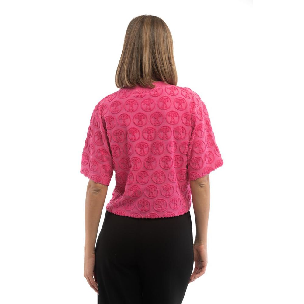 Elevate your wardrobe with the Moschino Fuchsia Cotton T-Shirt, a masterpiece of Italian craftsmanship, embodying luxury and effortless elegance for every occasion.