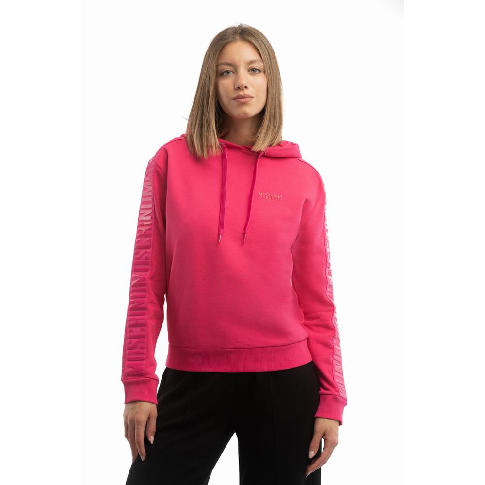 Elevate your wardrobe with the Moschino Fuchsia Cotton Sweatshirt, a 2023 masterpiece of luxurious cotton, designed for those who embrace individuality and sophistication.