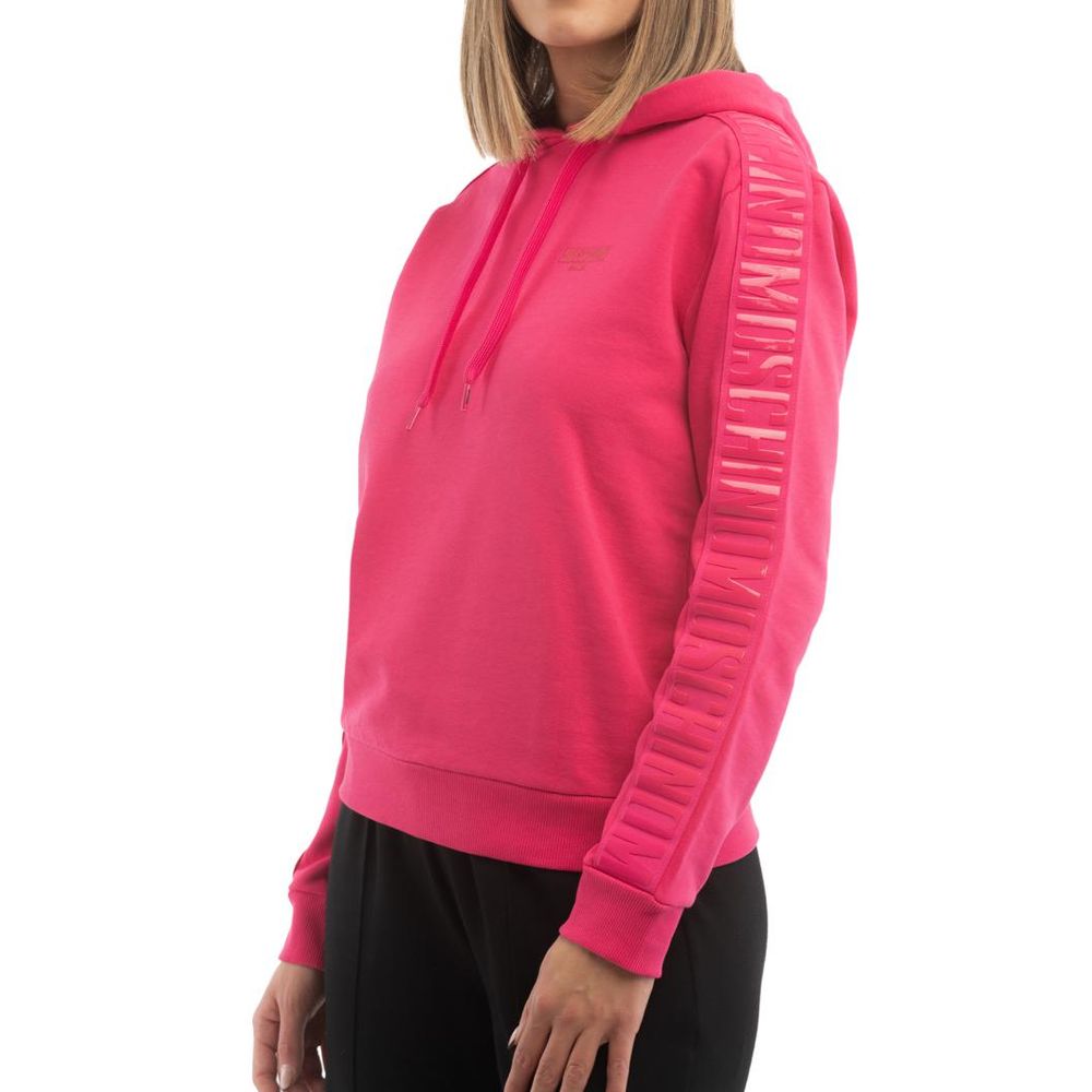 Indulge in the Moschino Fuchsia Cotton Sweatshirt, a 2023 masterpiece of Italian craftsmanship, blending luxurious comfort with chic sophistication for the discerning individual.