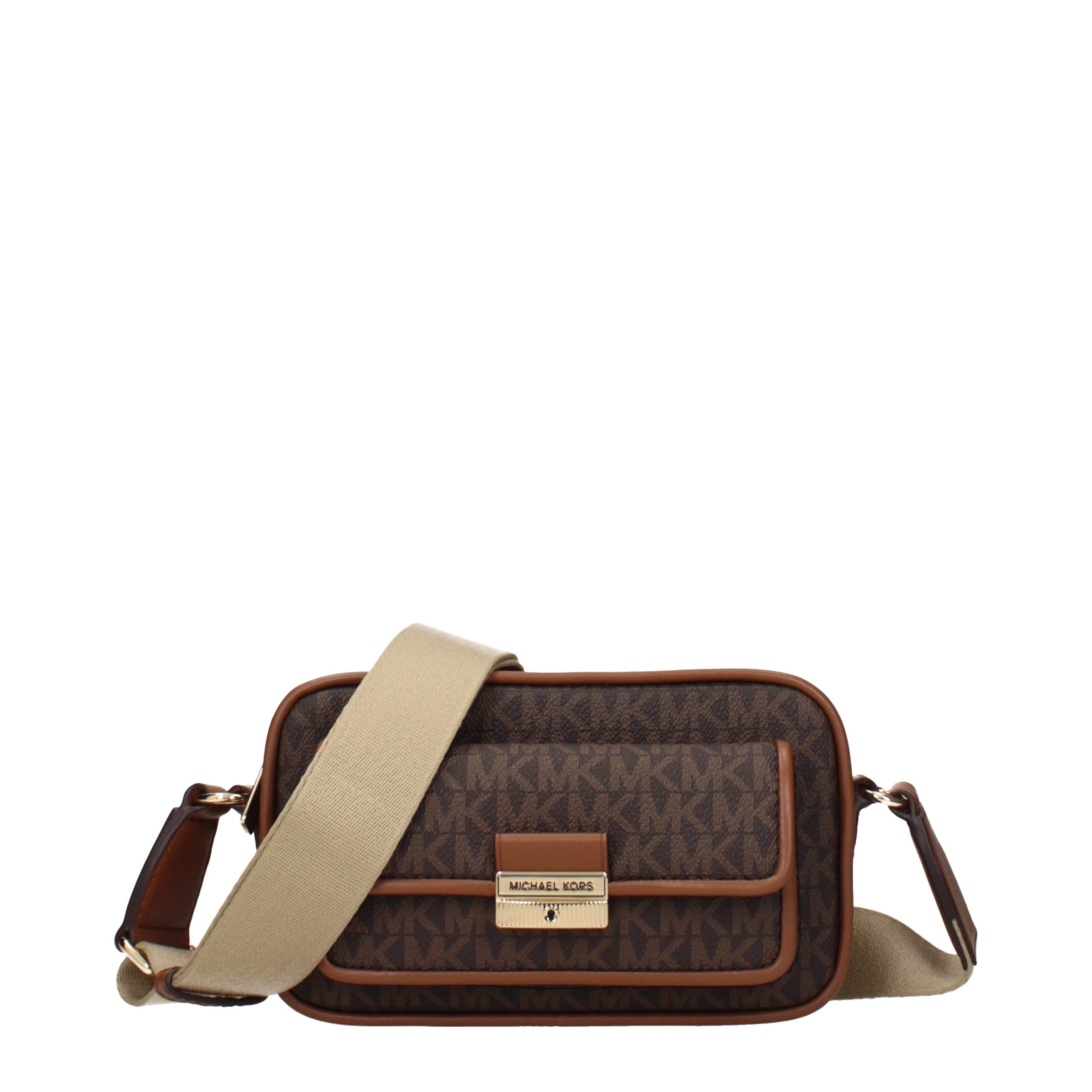 Elevate your style with the Michael Kors Brown Fabric Crossbody Bag, a luxurious blend of artisanal craftsmanship and timeless elegance for the discerning individual.