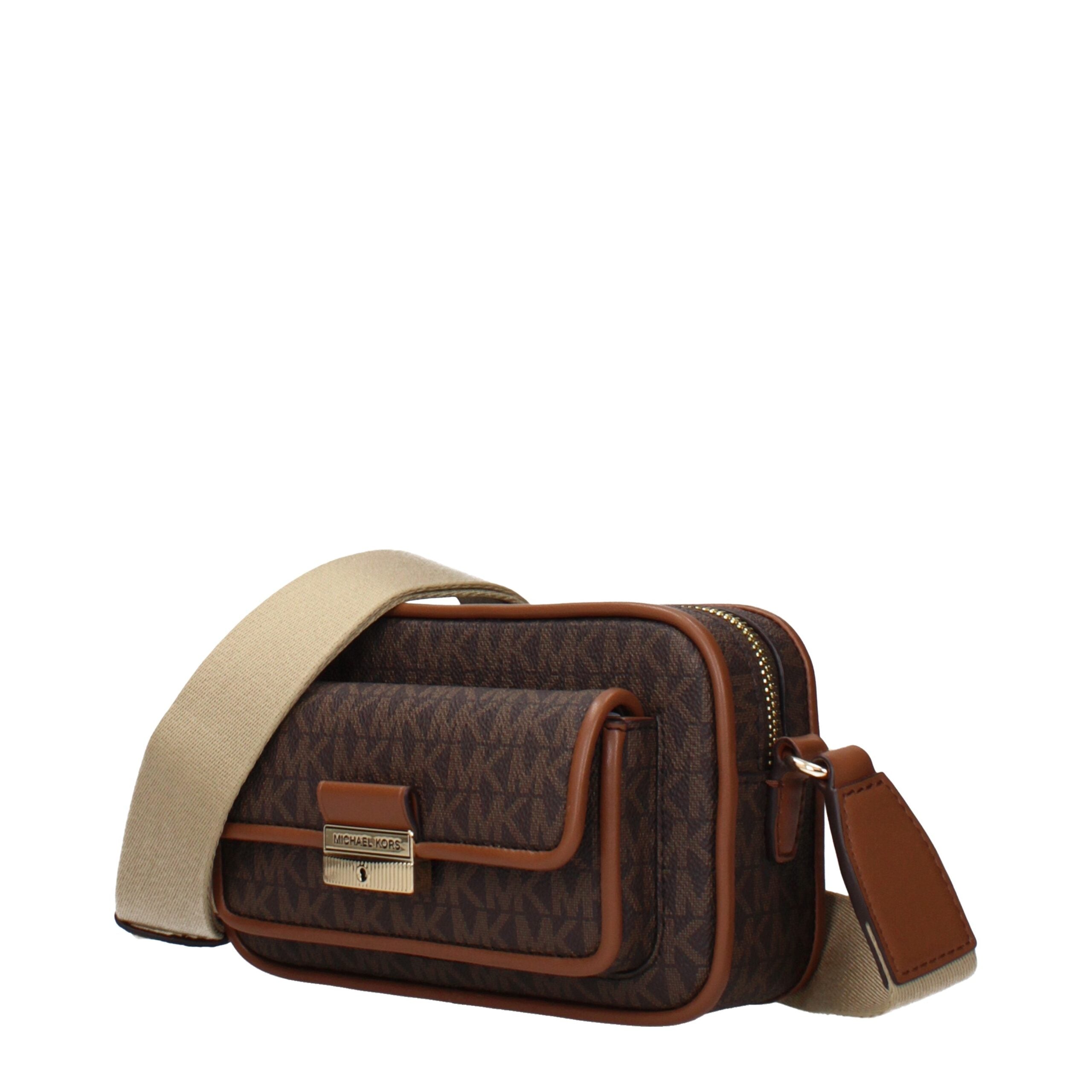 Elevate your style with the Michael Kors Brown Fabric Crossbody Bag, a luxurious blend of exquisite craftsmanship and timeless elegance, perfect for any occasion.