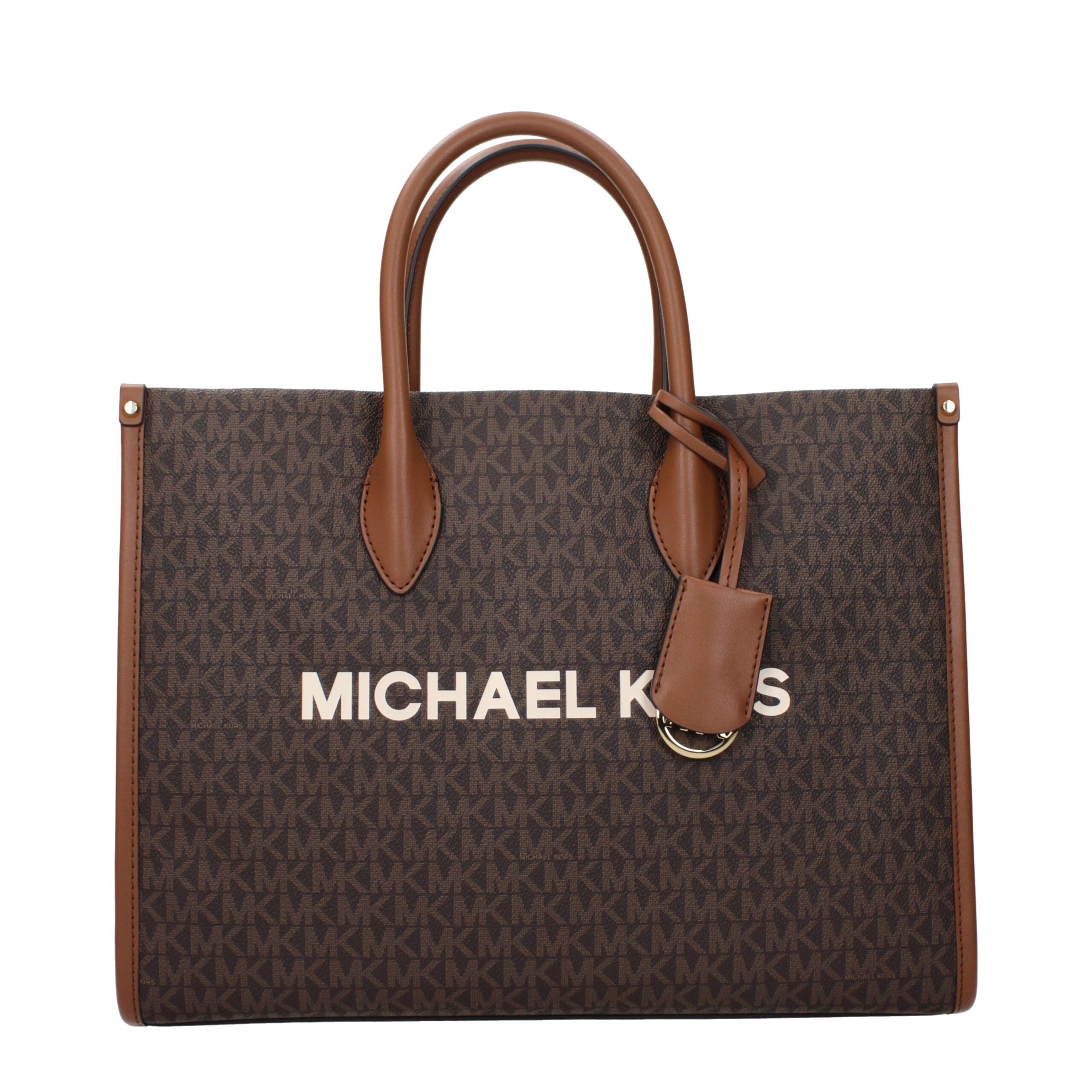 Discover the Michael Kors Brown Fabric Handbag, a timeless blend of luxury and versatility, perfect for those who embody elegance and sophistication.
