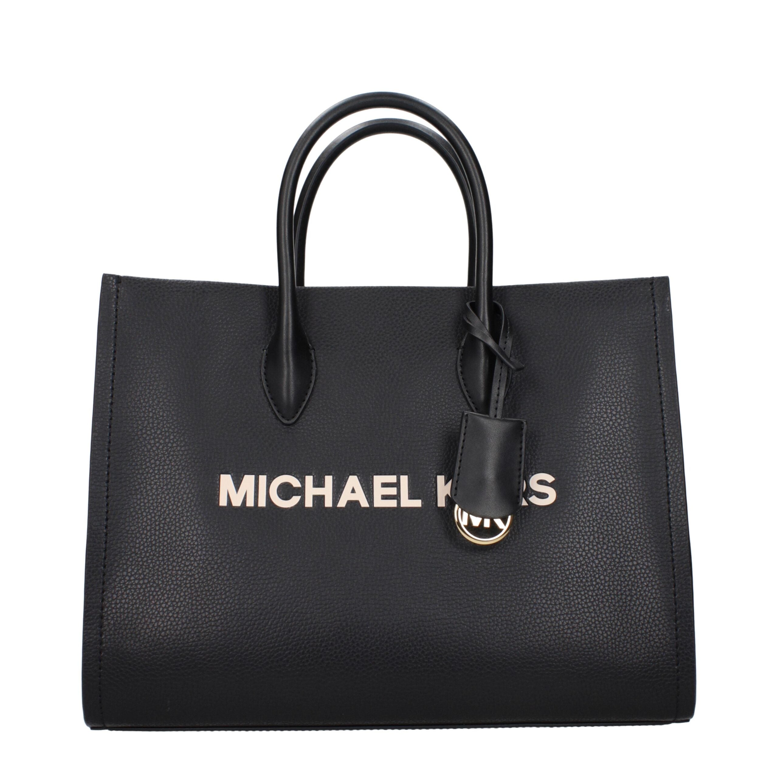 Elevate your elegance with the Michael Kors Black Leather Handbag, a timeless masterpiece crafted for those who embrace sophistication and luxury in every moment.