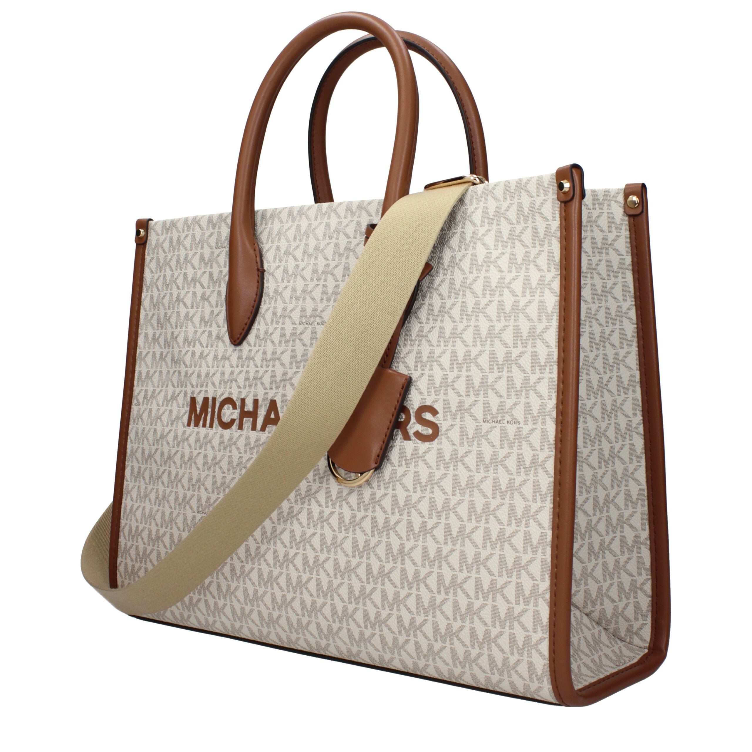 Indulge in the exquisite Michael Kors Beige Fabric Handbag, a timeless masterpiece of luxury and sophistication, perfect for elevating any ensemble with effortless elegance.
