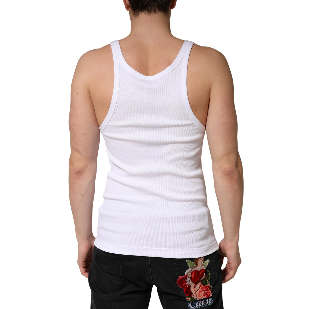 Indulge in the exquisite Dolce & Gabbana White Ribbed Cotton Sleeveless Tank Top, a timeless piece crafted from premium stretch cotton, embodying refined Italian craftsmanship for effortless elegance.