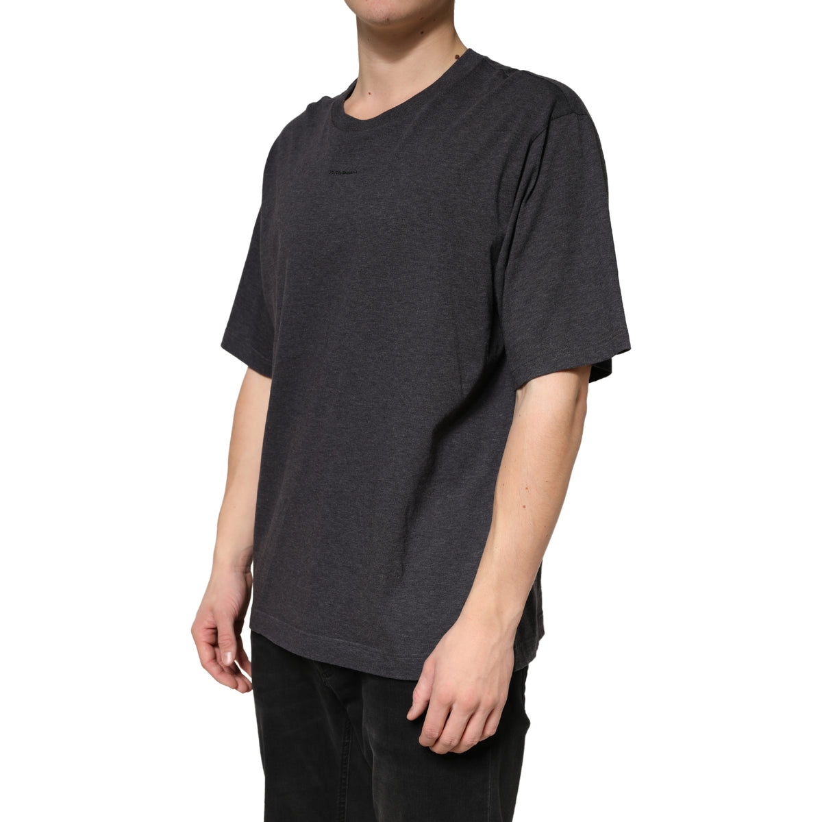Indulge in the exquisite allure of Dolce & Gabbana's Dark Grey Cotton Crewneck Short Sleeve T-shirt, where Italian craftsmanship meets timeless luxury for the discerning individual.