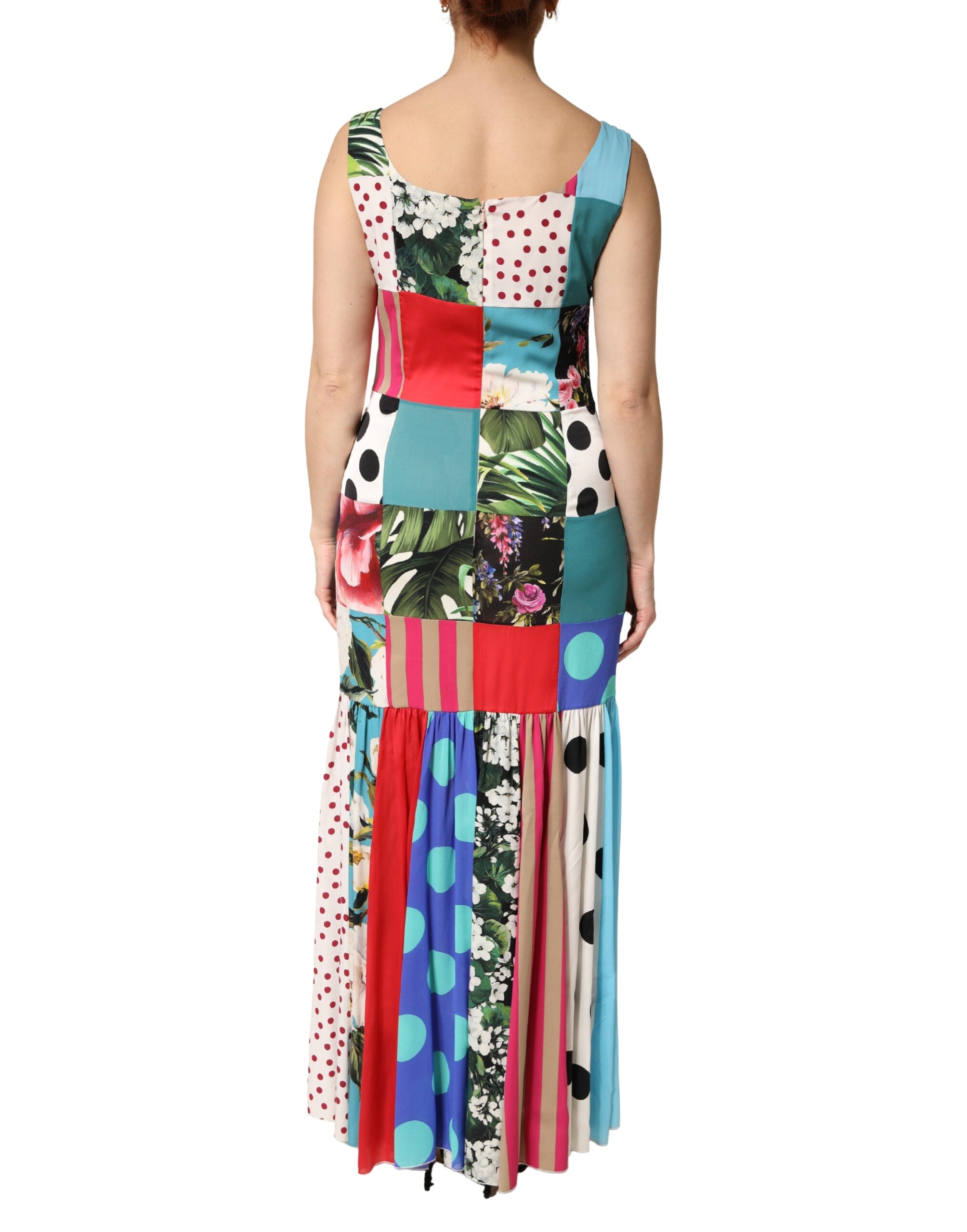 Indulge in the allure of the Dolce & Gabbana Multicolor Patchwork Silk Sleeveless Dress, a masterpiece of Italian craftsmanship that embodies luxury and sophistication.