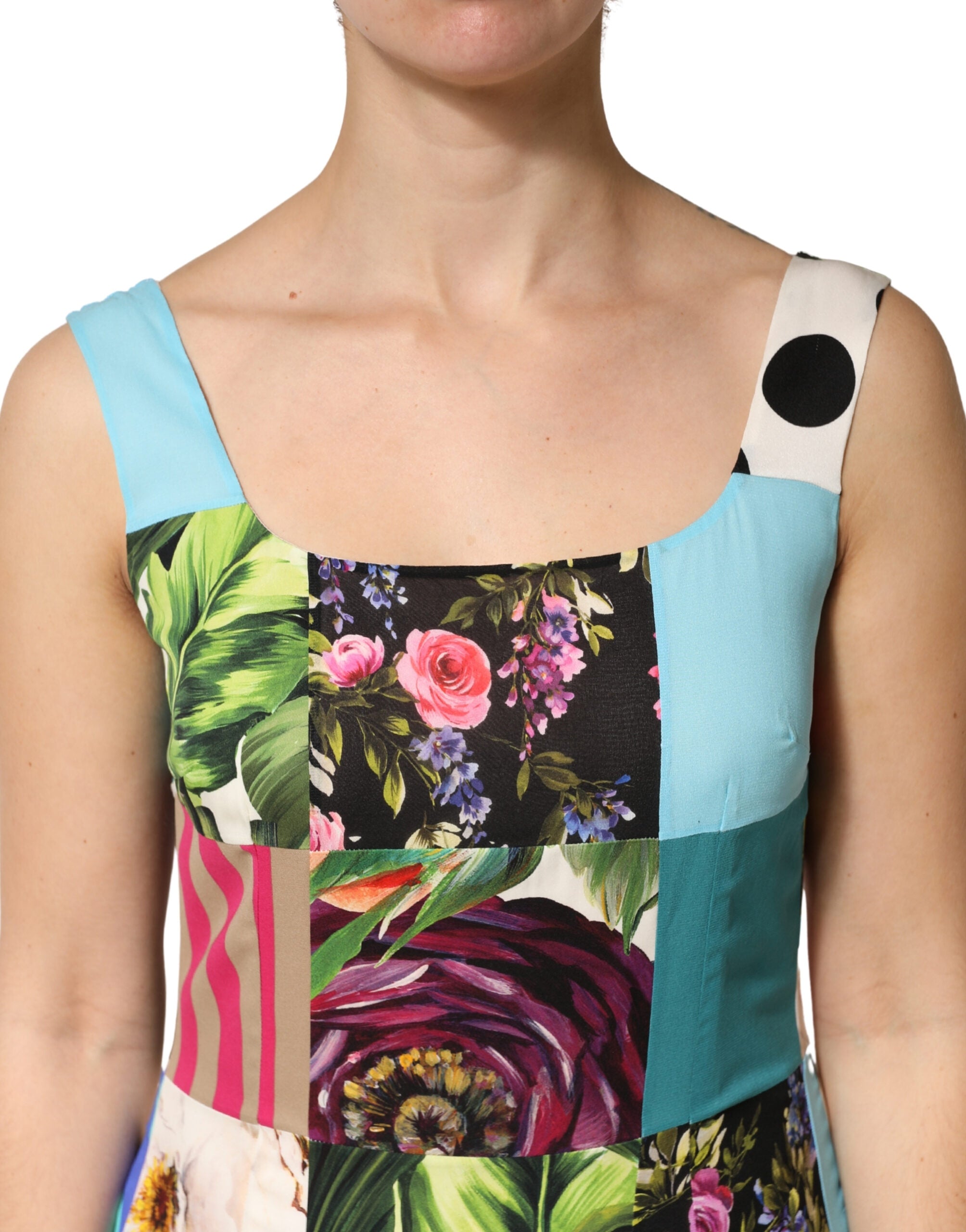 Discover the allure of the Dolce & Gabbana Multicolor Patchwork Silk Sleeveless Dress, where luxurious silk and exquisite craftsmanship create an unforgettable statement.