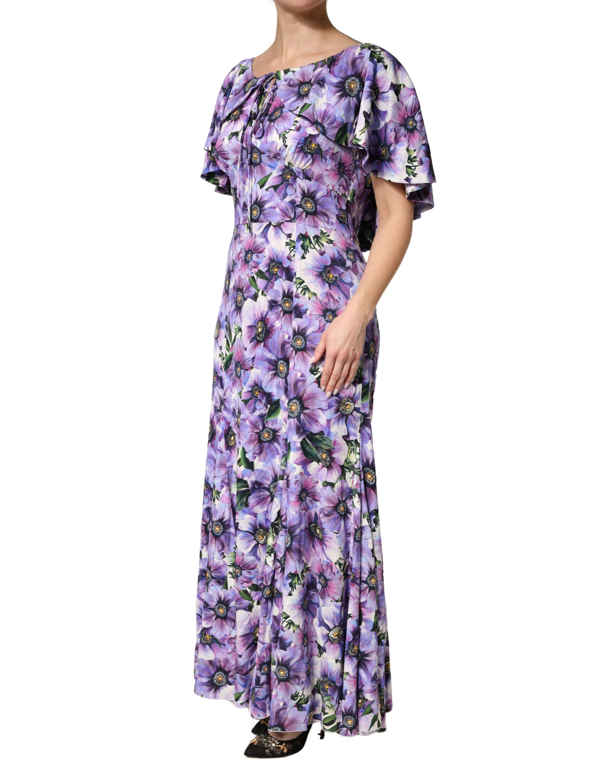 Indulge in the exquisite allure of the Dolce & Gabbana Purple Floral Silk Stretch Elegant Gown, a masterpiece of Italian craftsmanship that embodies timeless luxury and refined elegance for unforgettable moments.