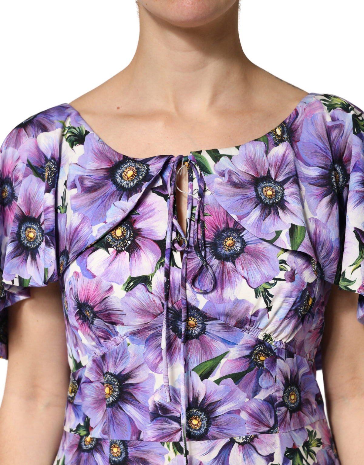 Indulge in the exquisite allure of the Dolce & Gabbana Purple Floral Silk Stretch Elegant Gown, crafted in Italy from luxurious silk, embodying timeless elegance for unforgettable moments.