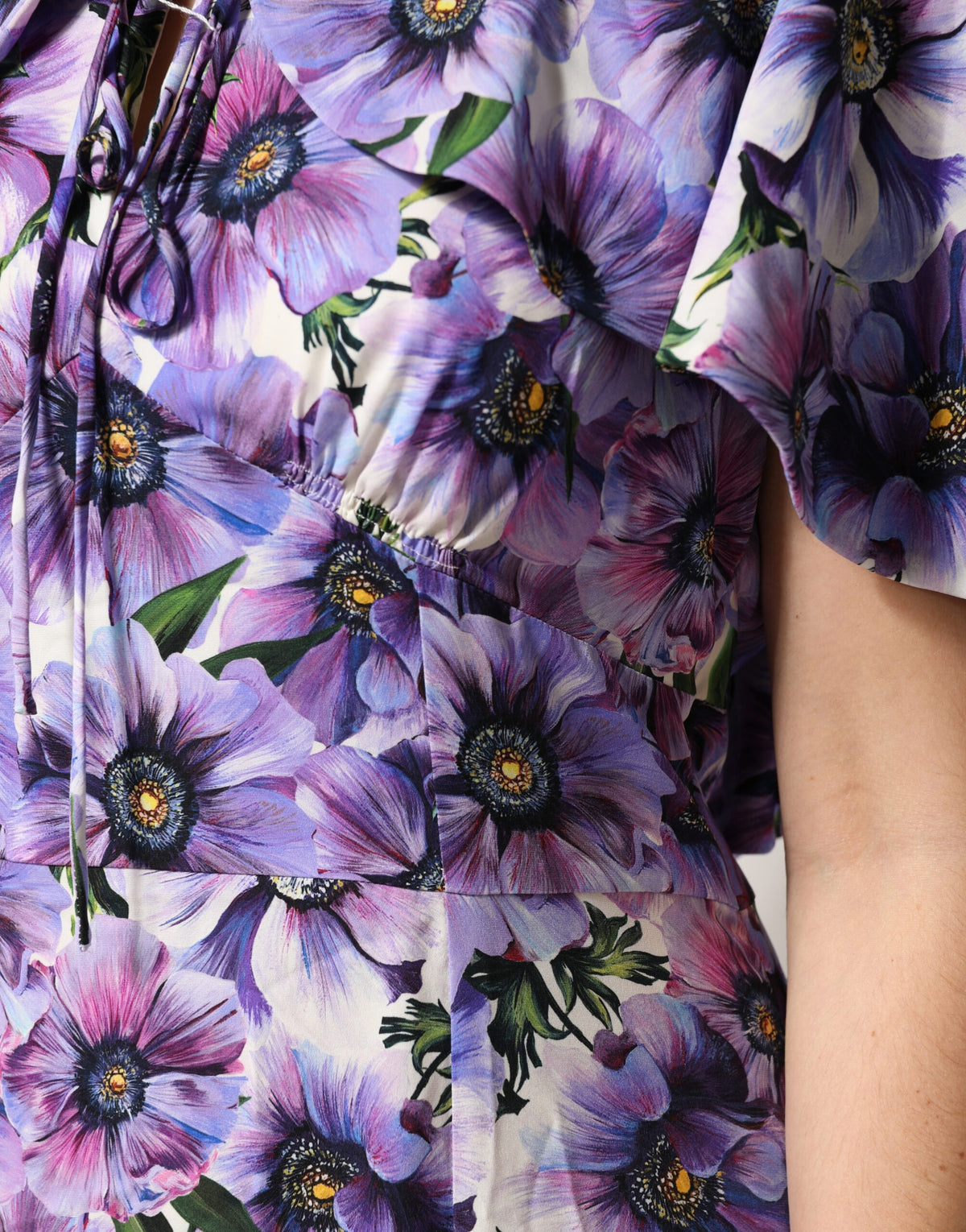 Indulge in the exquisite allure of the Dolce & Gabbana Purple Floral Silk Stretch Elegant Gown, crafted from luxurious silk for timeless sophistication and captivating elegance.