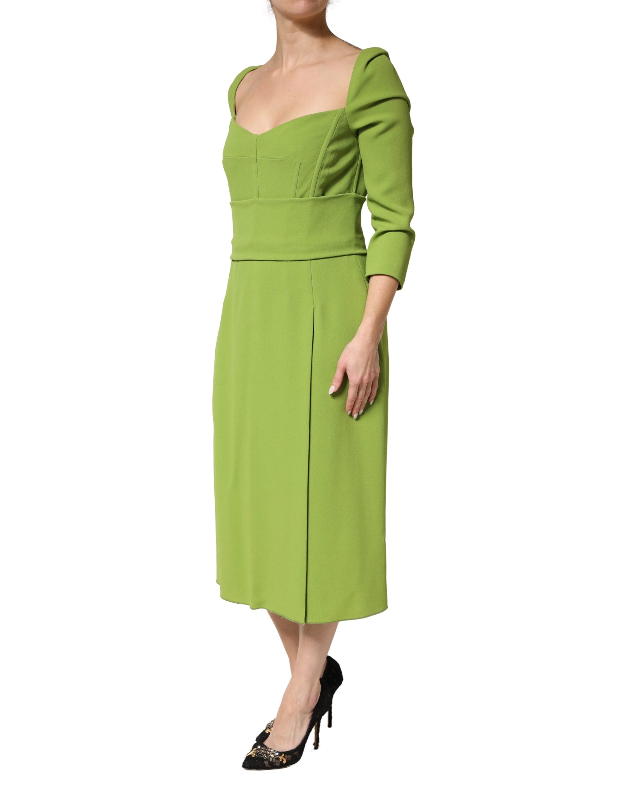 Discover the Dolce & Gabbana Green Silk Sweetheart Neckline Midi Dress, a masterpiece of Italian craftsmanship that embodies elegance and sophistication for any occasion.