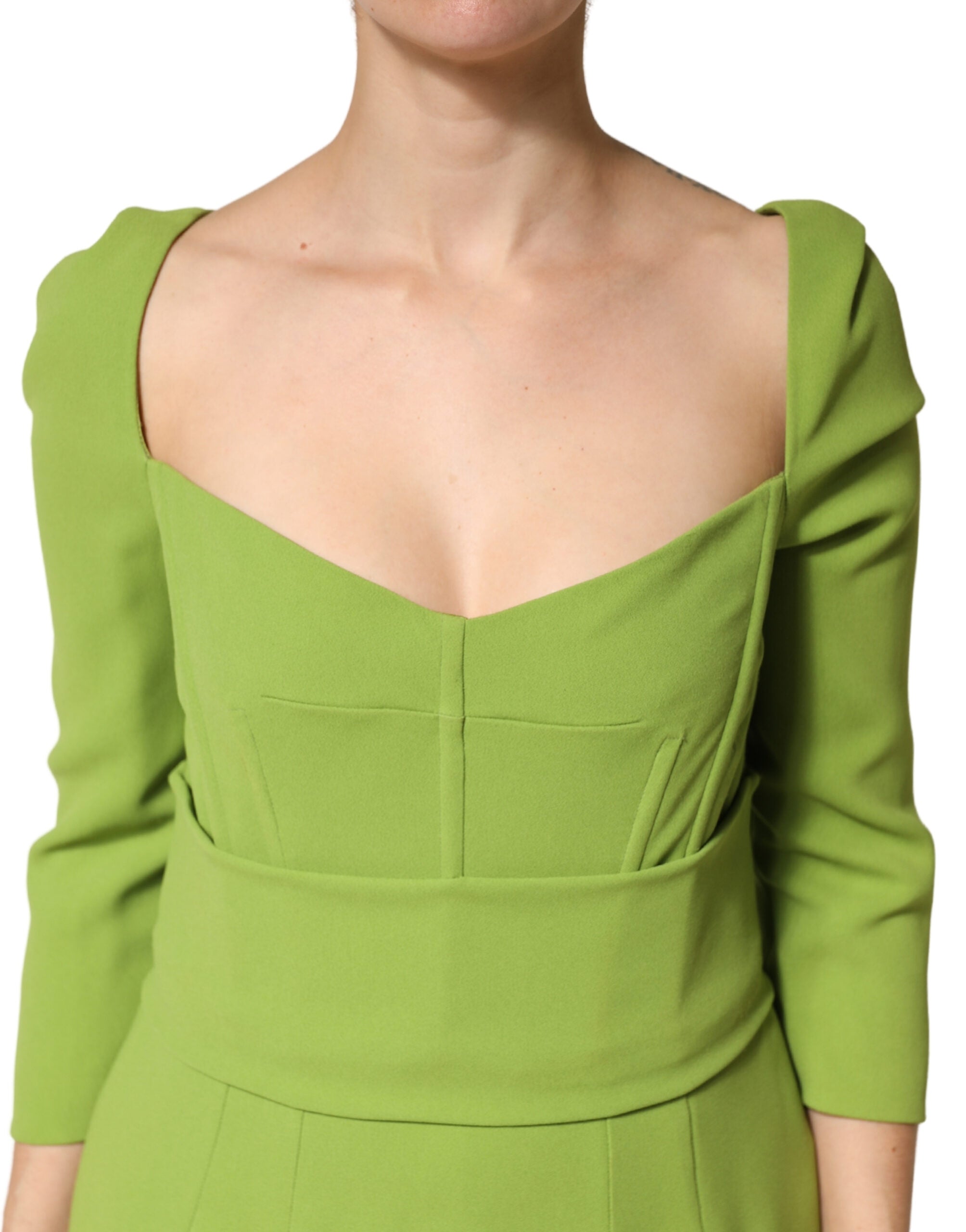 Discover the Dolce & Gabbana Green Silk Sweetheart Neckline Midi Dress, a masterpiece of Italian craftsmanship that embodies elegance and sophistication for any refined occasion.