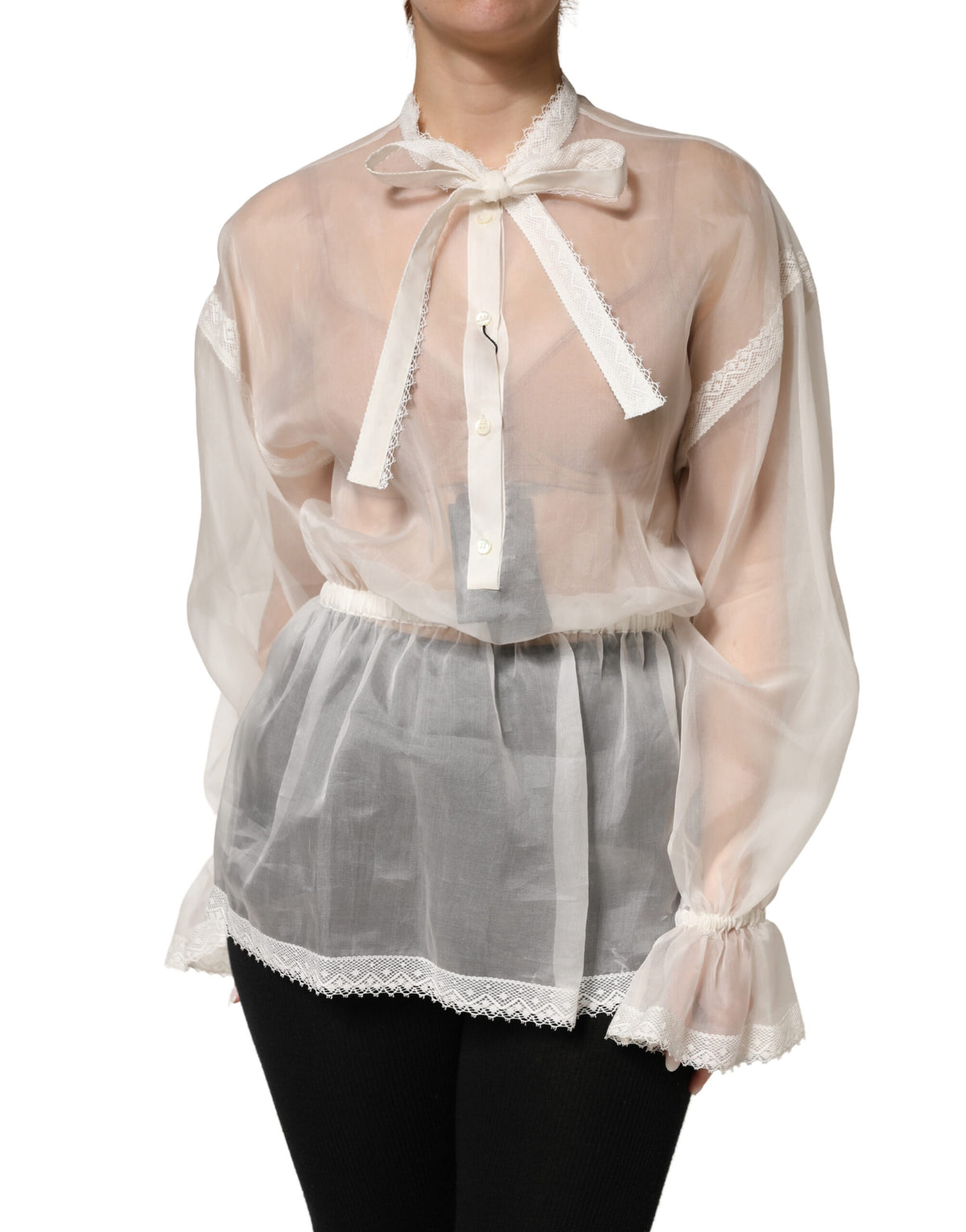 Elevate your wardrobe with the Dolce & Gabbana White Sheer Silk Blouse, a masterpiece of Italian craftsmanship that embodies refined luxury and romantic allure.