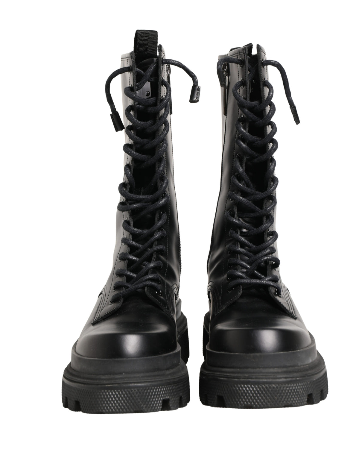Step into the realm of sophistication with Dolce & Gabbana's Black Leather Trek Sole Combat Boots, crafted from premium spazzolato leather for a bold, modern allure.