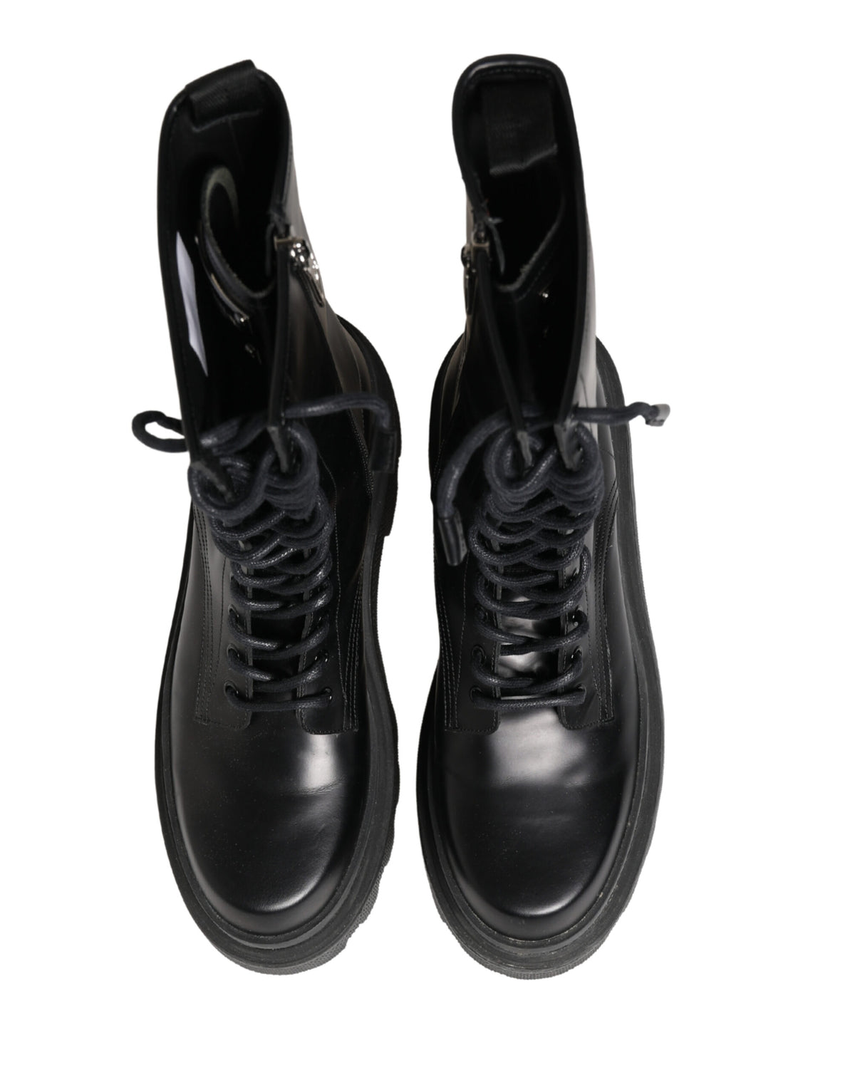 Indulge in the exquisite allure of Dolce & Gabbana's Black Leather Trek Sole Combat Boots, where Italian craftsmanship meets modern elegance for the discerning connoisseur.