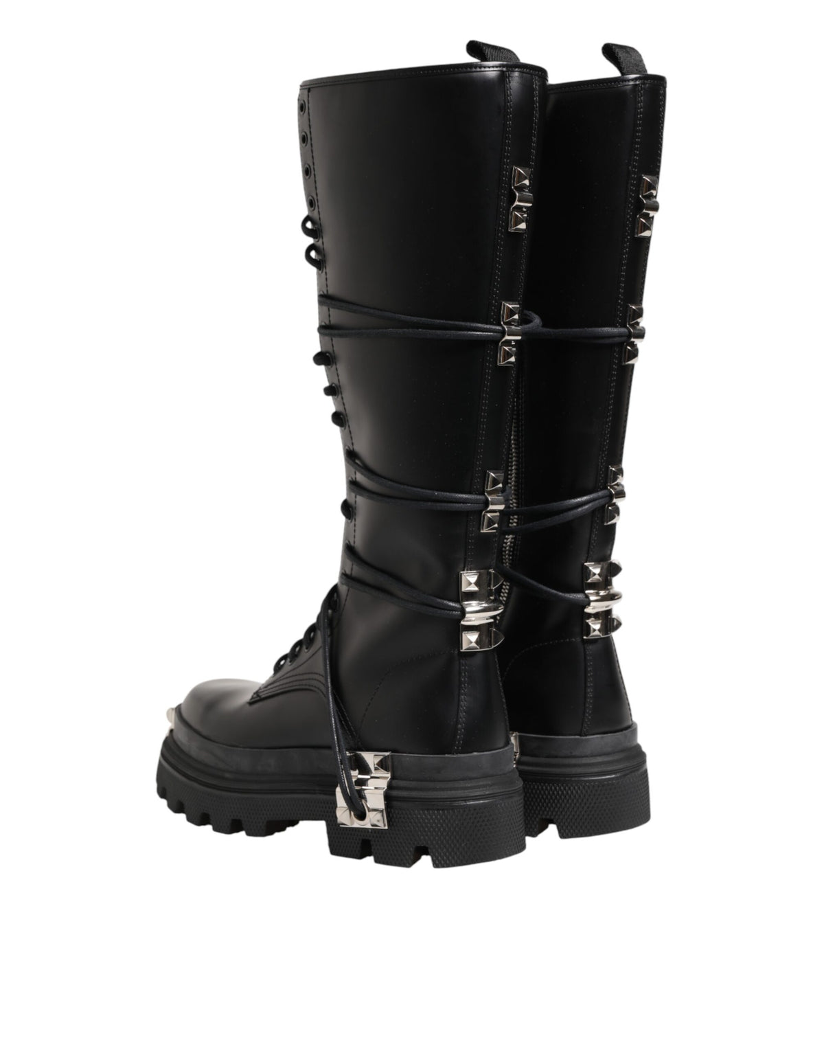 Elevate your style with Dolce & Gabbana Black Leather Knee High Combat Boots, crafted from premium leather, merging luxury with edgy sophistication for the modern connoisseur.