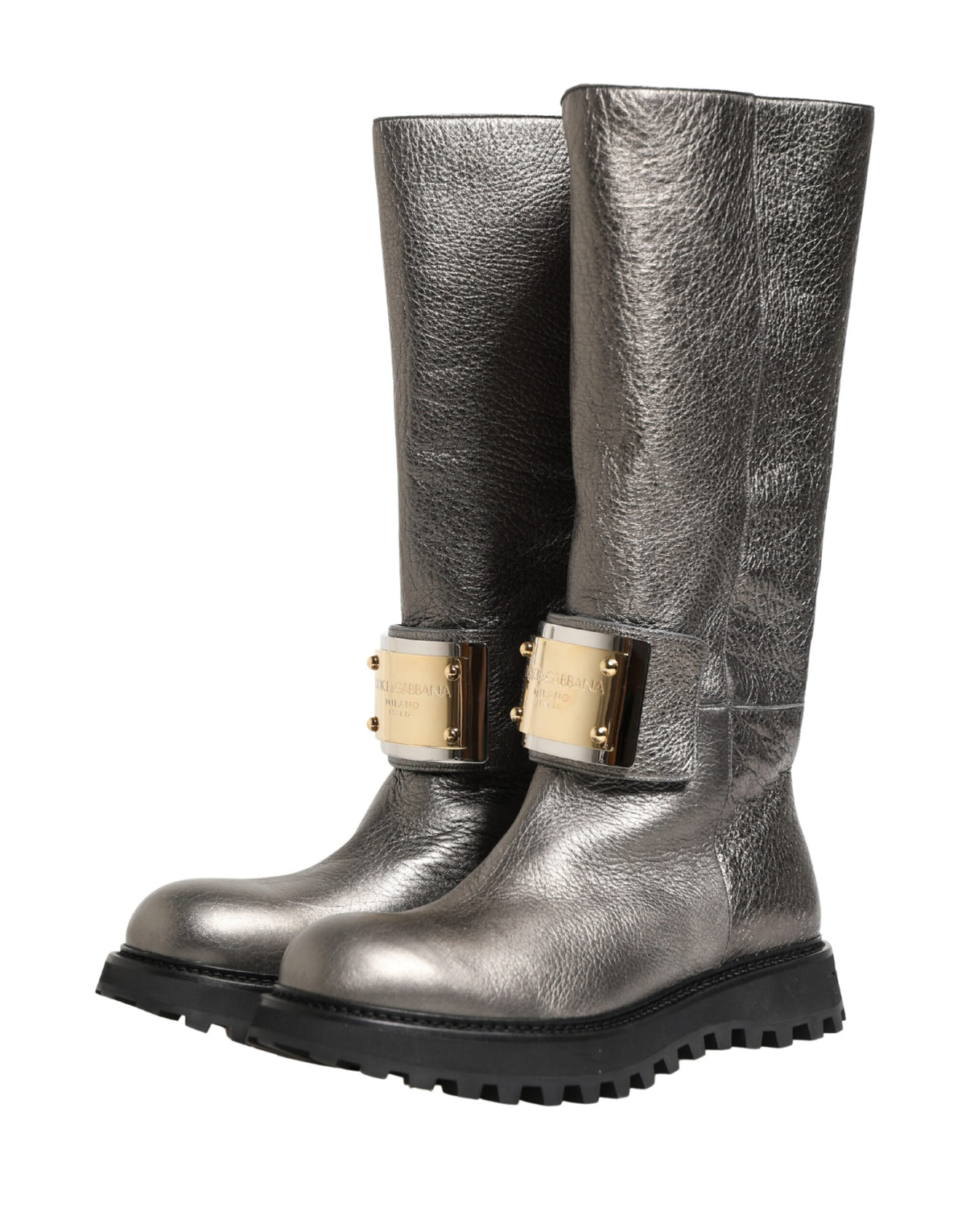 Step into a realm of elegance with Dolce & Gabbana's Metallic Silver Leather Mid Calf Boots, crafted from premium cervo laminato leather, embodying luxury and timeless sophistication.