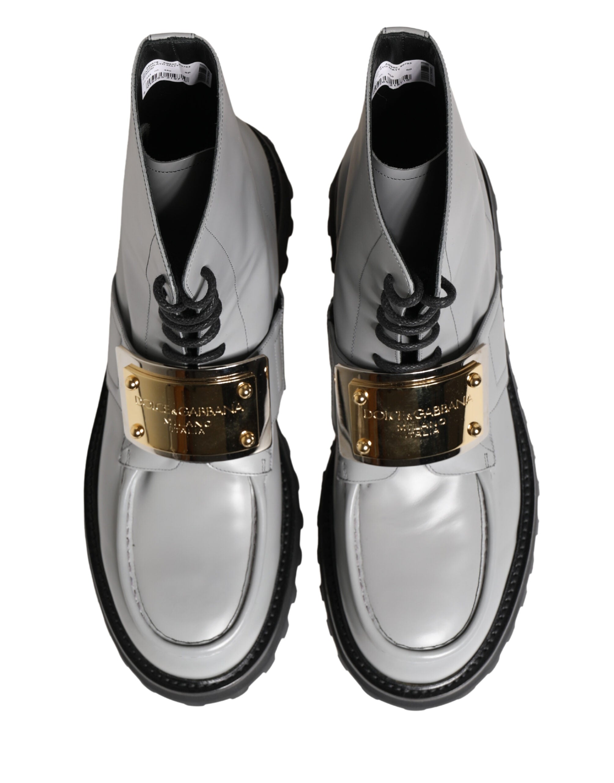 Step into refined elegance with Dolce & Gabbana's Gray Leather Logo Plaque Ankle Boots, crafted from luxurious spazzolato matte leather for the discerning connoisseur.