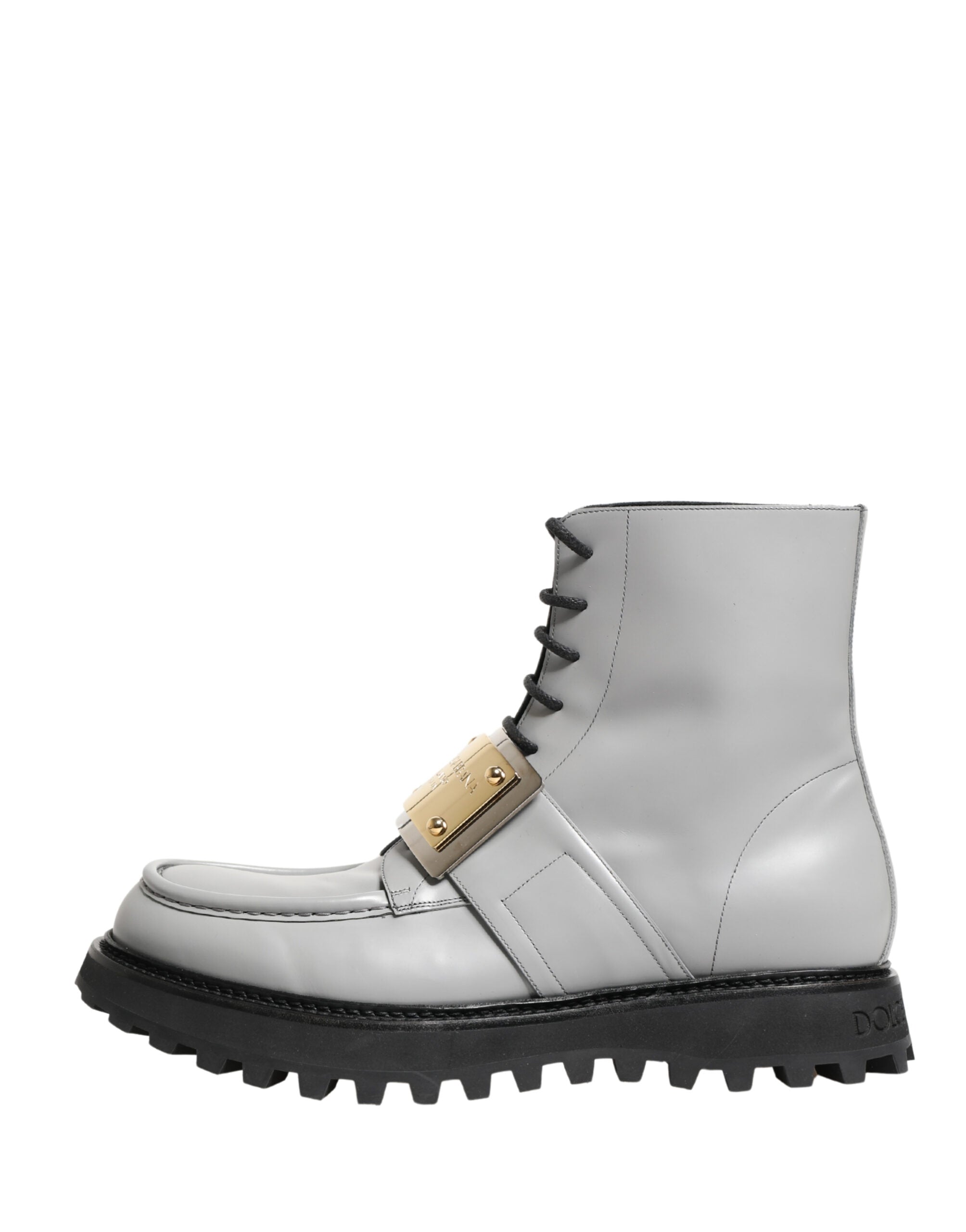 Step into refined elegance with Dolce & Gabbana's Gray Leather Logo Plaque Ankle Boots, crafted from luxurious spazzolato matte leather for the discerning connoisseur.