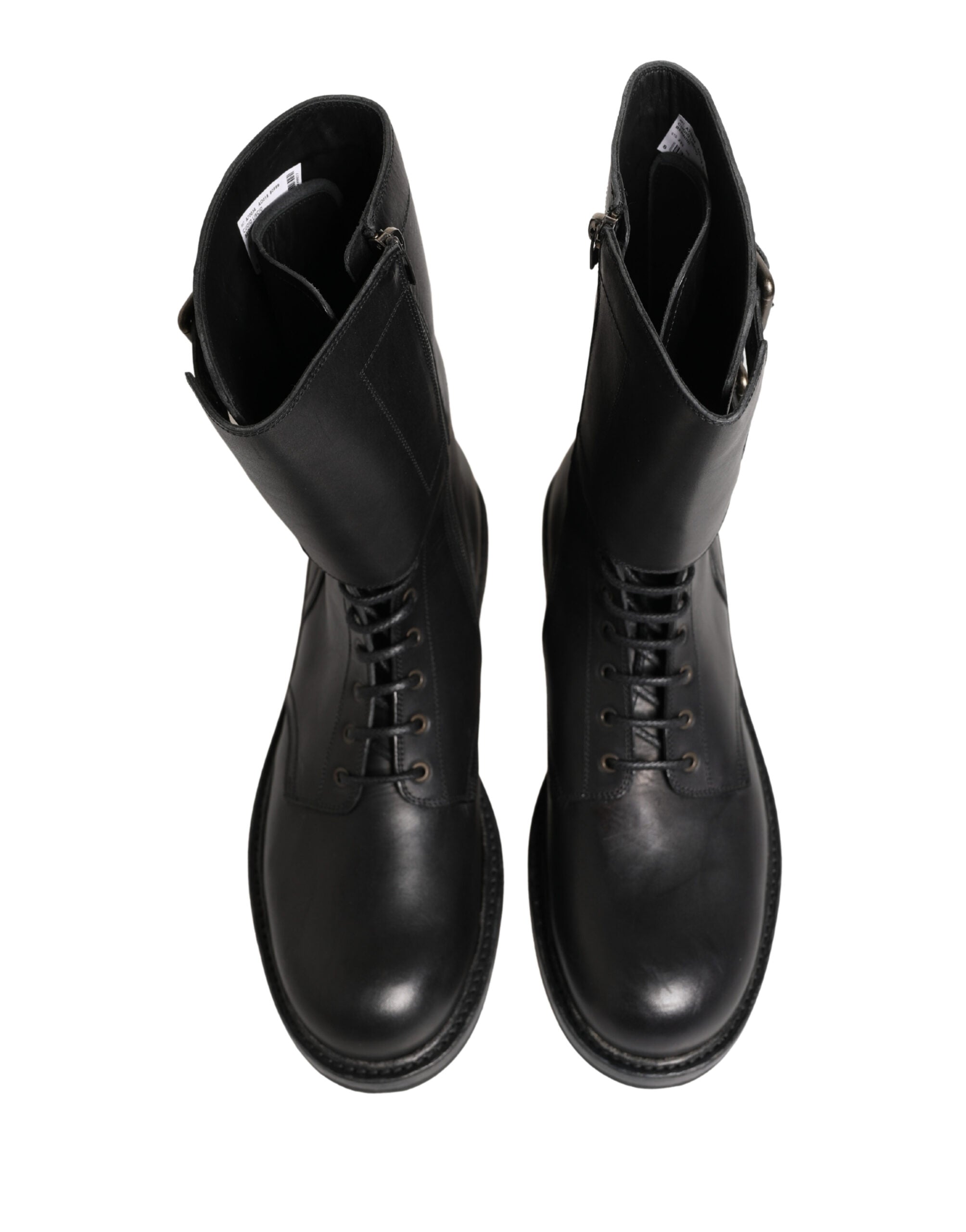 Indulge in the exquisite Dolce & Gabbana Black Leather Belted Buckle Combat Boots, where premium craftsmanship meets a rugged yet refined silhouette, perfect for the discerning individual.