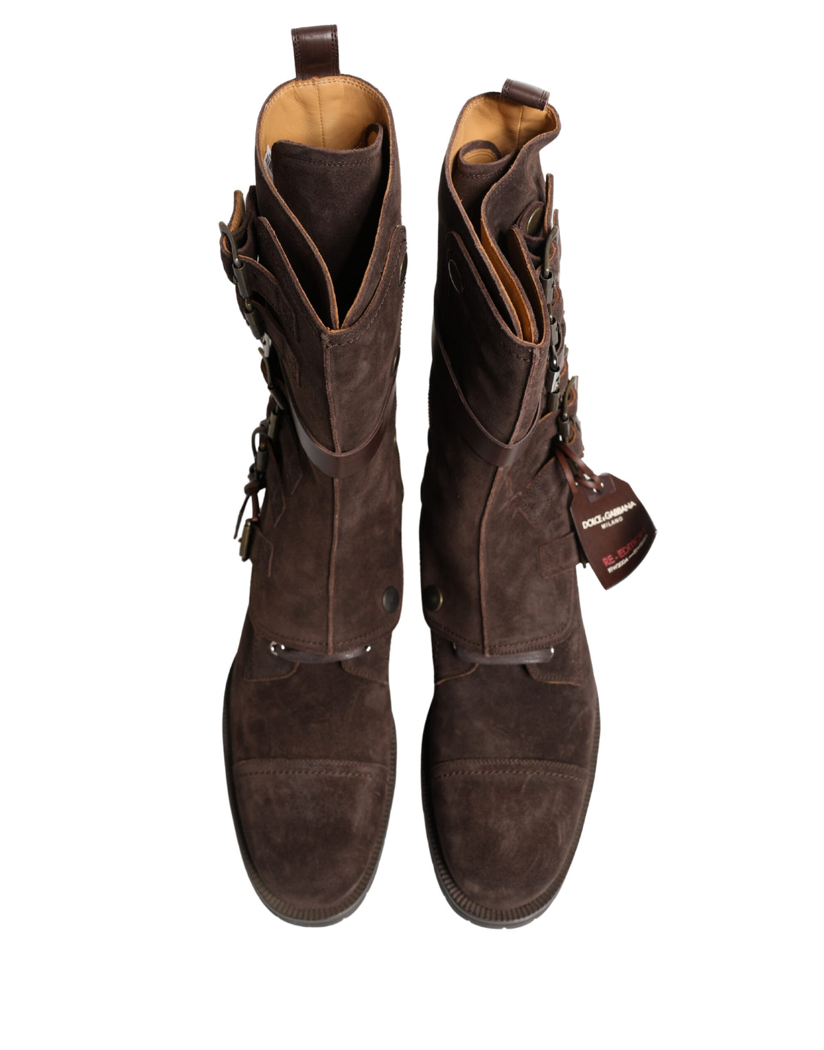 Indulge in the allure of Dolce & Gabbana's Brown Suede Leather Combat Ankle Boots, where Italian craftsmanship meets rugged elegance, perfect for the discerning fashion aficionado.