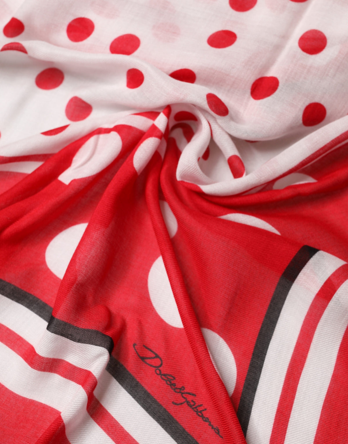 Indulge in the Dolce & Gabbana Red Polka Dot Print Square Stole, a luxurious blend of modal and cashmere, perfect for elevating any sophisticated ensemble.