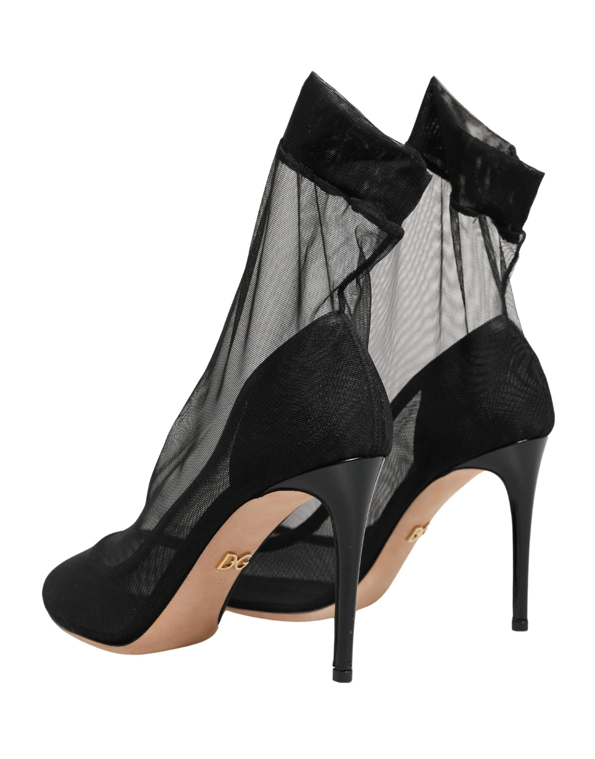 Step into the realm of luxury with Dolce & Gabbana's Black Nylon Stretch Mesh Sock Boots, where exquisite Italian craftsmanship meets a captivating silhouette, perfect for the discerning individual.