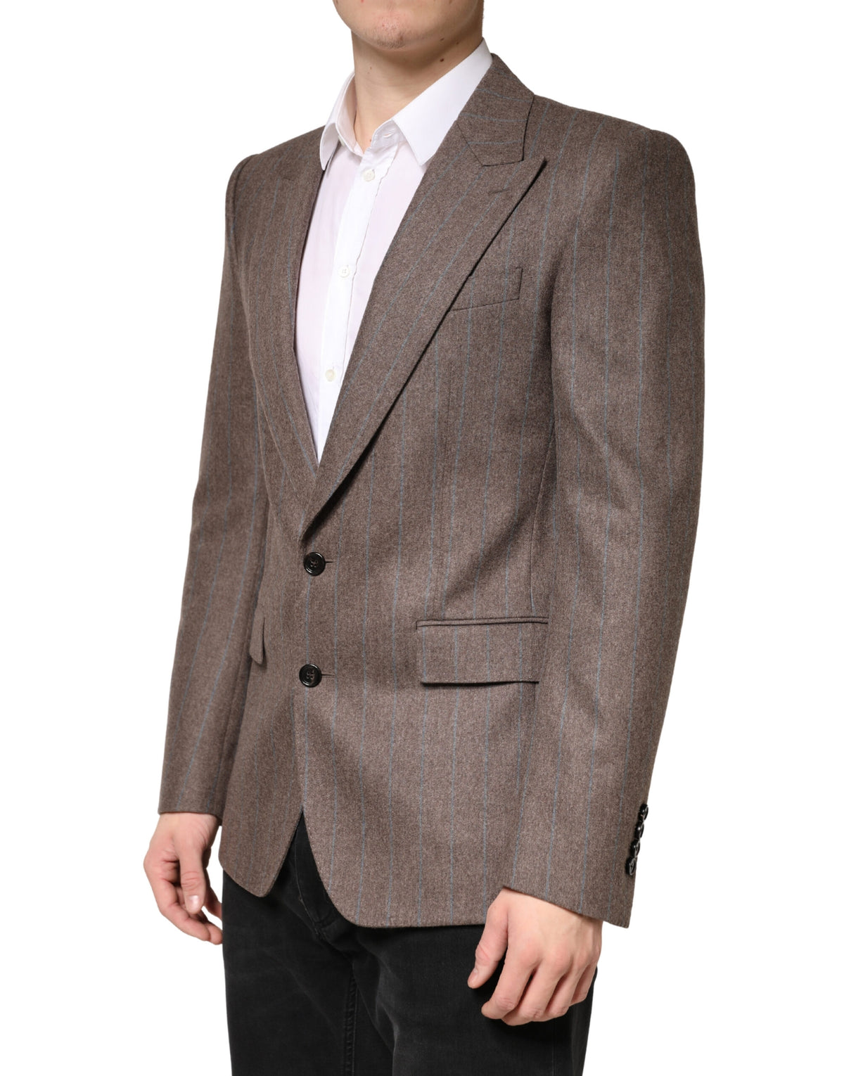 Indulge in the timeless elegance of the Dolce & Gabbana Brown Stripes Blazer, crafted from luxurious virgin wool and silk, embodying exquisite Italian craftsmanship for the discerning individual.