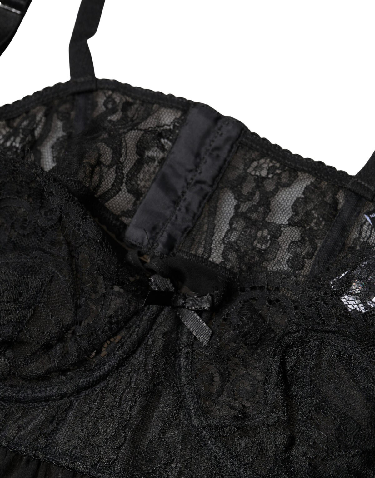 Indulge in the exquisite allure of Dolce & Gabbana's Black Silk Floral Lace Lingerie Top, a masterpiece of Italian craftsmanship that redefines elegance and sensuality.