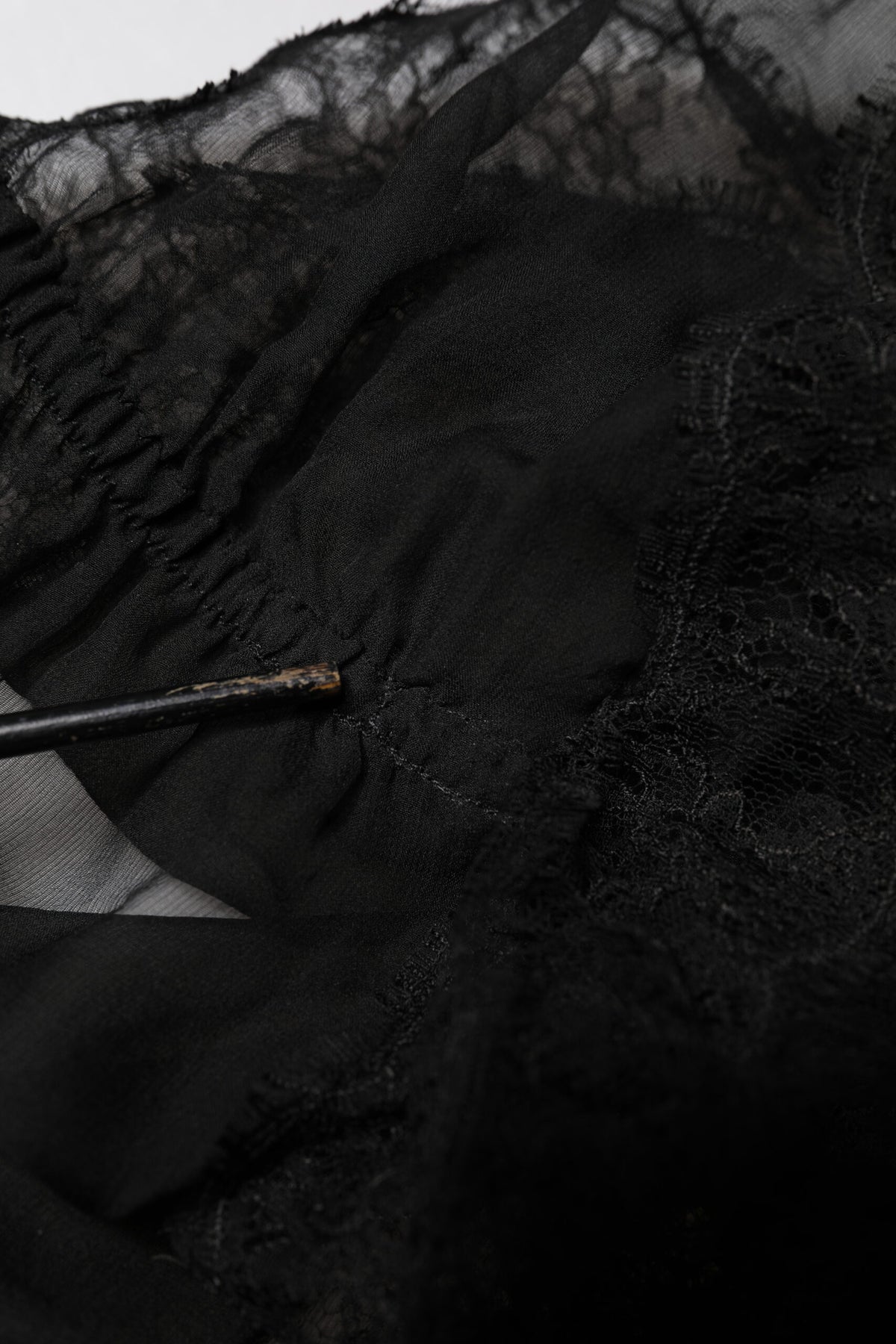 Experience the allure of Dolce & Gabbana's Black Silk Floral Lace Lingerie Top, where exquisite craftsmanship meets luxurious materials for a timeless statement of elegance.