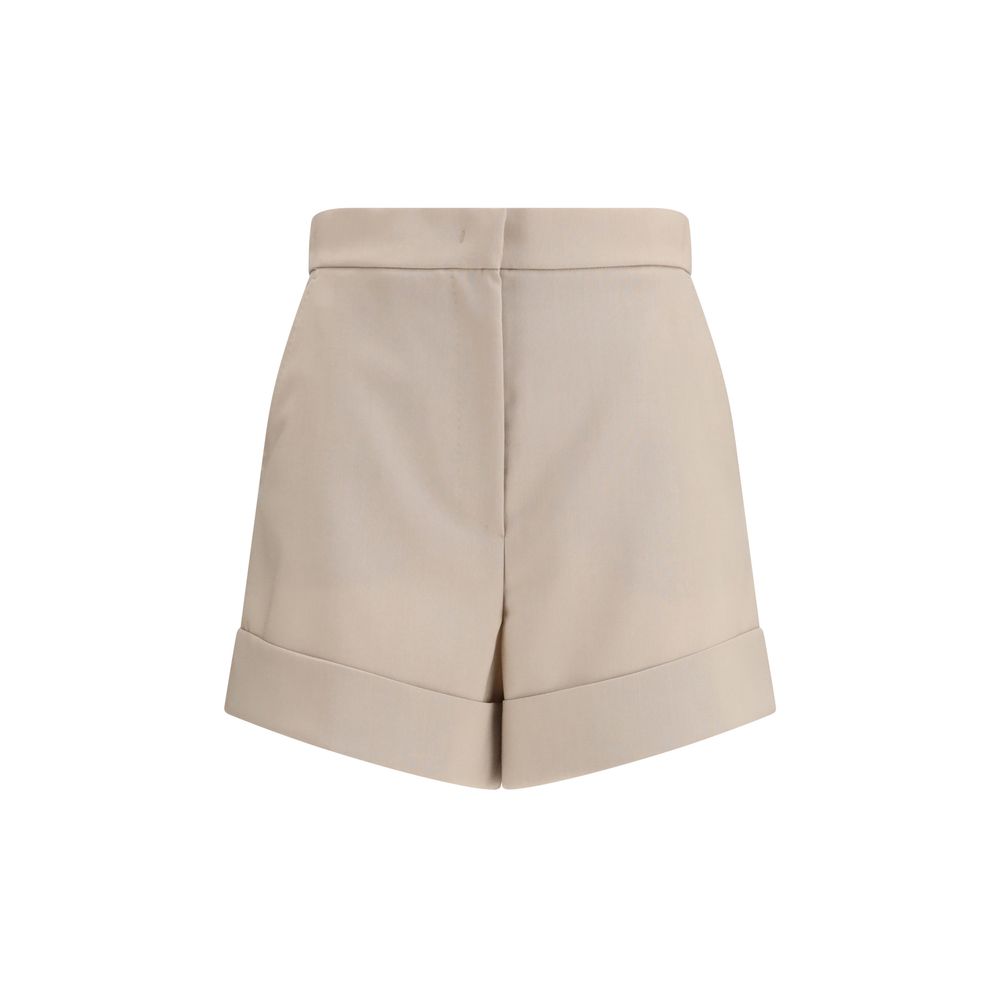 Indulge in the exquisite elegance of Max Mara's Bicolor Fleece Wool Shorts, crafted from a luxurious blend of fleece wool, mohair, and silk for timeless sophistication.