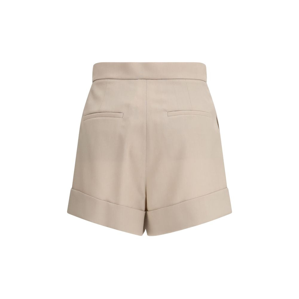 Indulge in the exquisite elegance of Max Mara's Bicolor Fleece Wool Shorts, crafted from a luxurious blend of fleece wool, mohair, and silk for timeless sophistication.