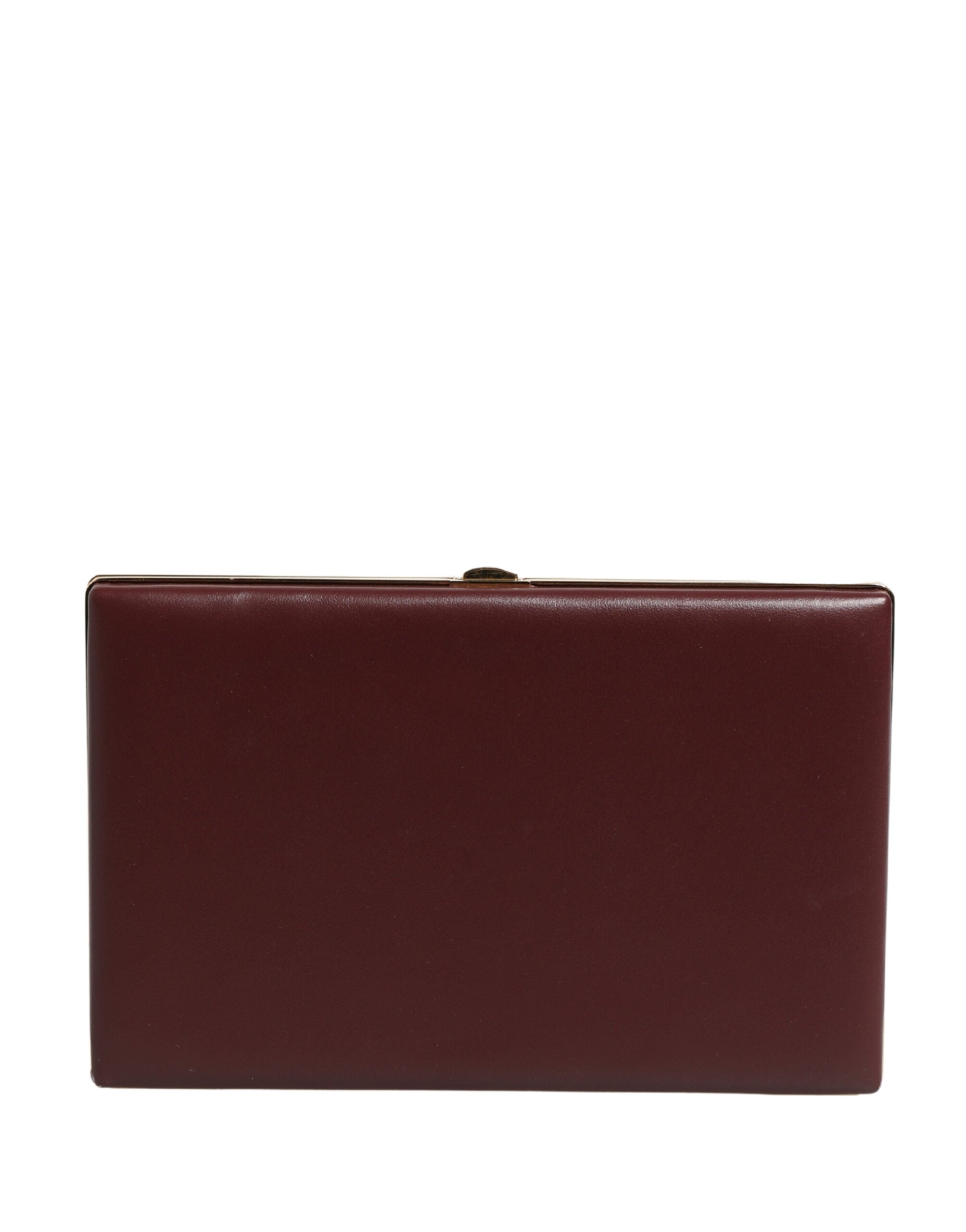 Indulge in the exquisite allure of the Dolce & Gabbana Brown Calfskin Leather Clutch, a handcrafted masterpiece that embodies Italian luxury and timeless elegance for every sophisticated affair.