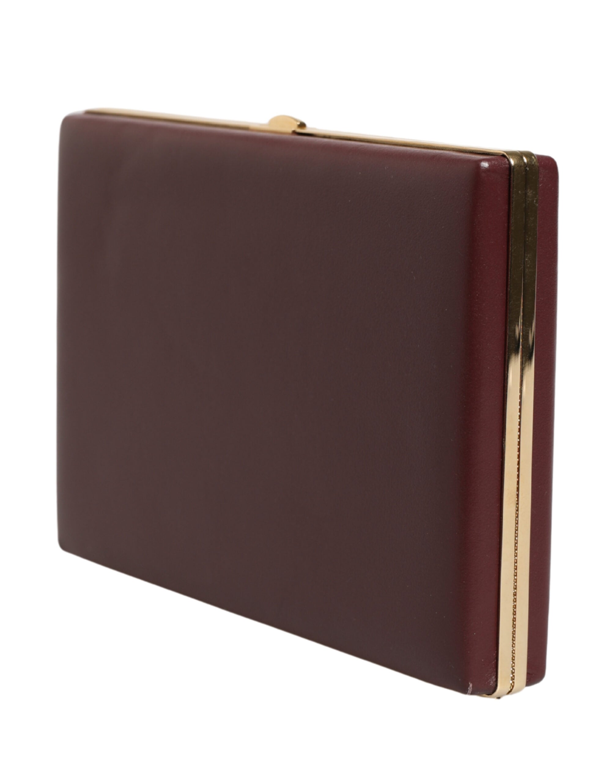 Indulge in the exquisite Dolce & Gabbana Brown Calfskin Leather Clutch, a handcrafted masterpiece that embodies Italian luxury and sophistication for unforgettable evenings.