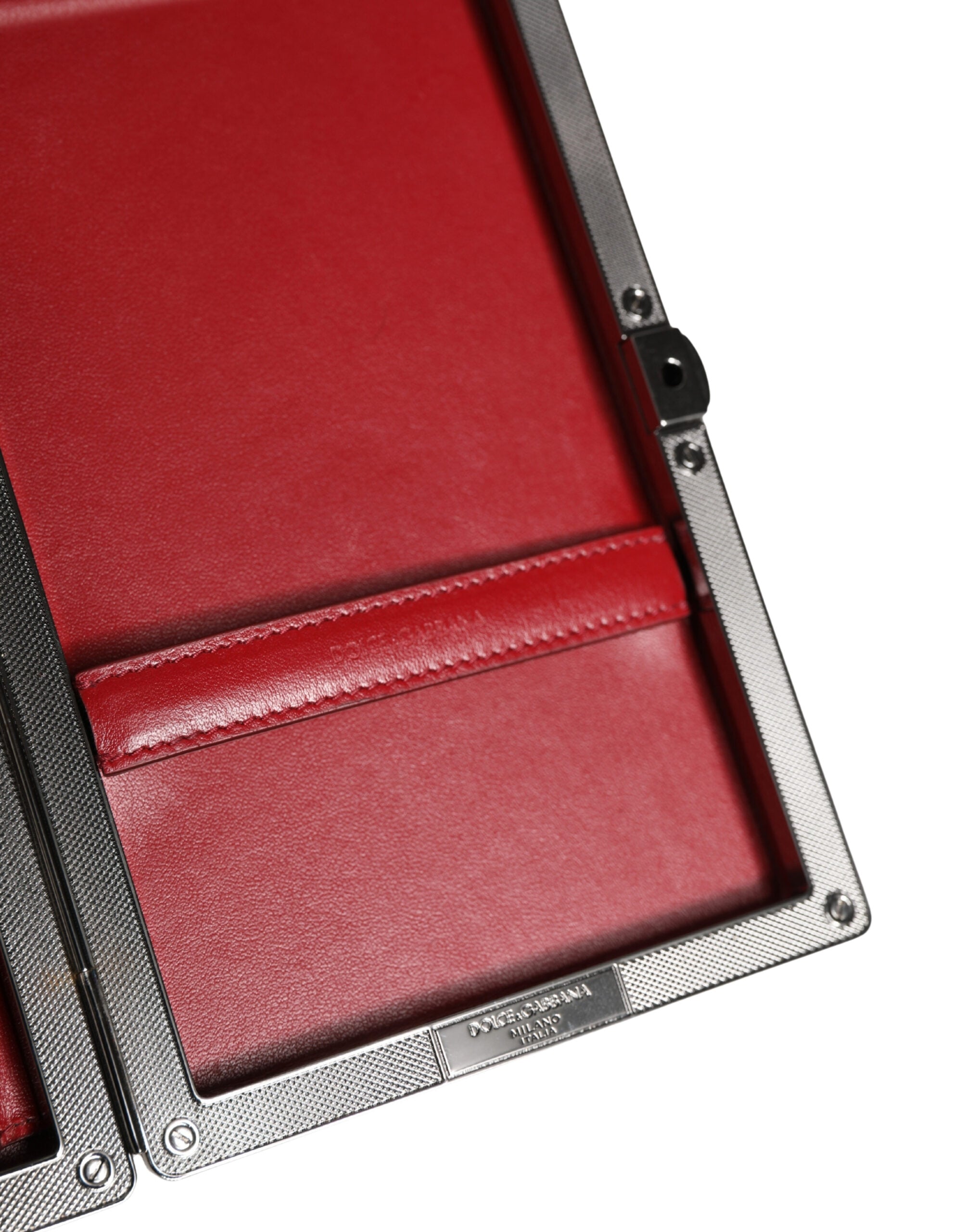 Indulge in the exquisite Dolce & Gabbana Beige Velvet Calf Leather Clutch, a timeless accessory that embodies luxury and sophistication for unforgettable evenings.