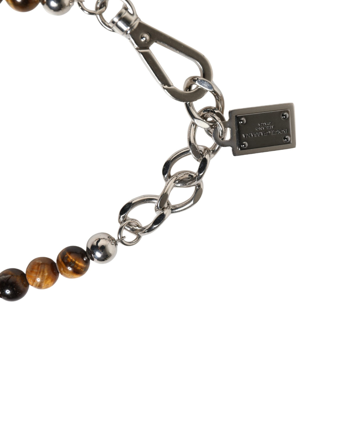 Indulge in the allure of Dolce & Gabbana's Silver Tone Brass Chain Beaded Gem Bracelet, a masterpiece of Italian craftsmanship that elevates your elegance and sophistication.