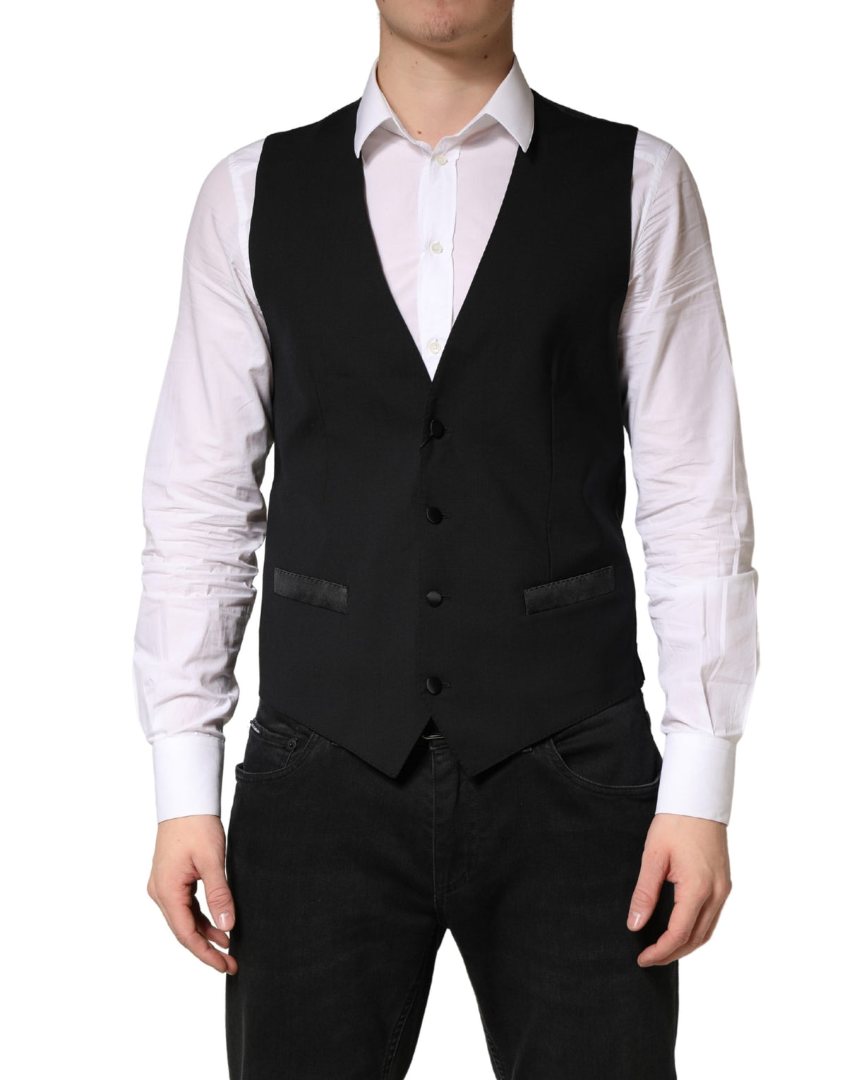 Discover the Dolce & Gabbana Black Wool Dress Waistcoat, a masterpiece of Italian craftsmanship, blending luxurious materials for the discerning individual who values elegance.