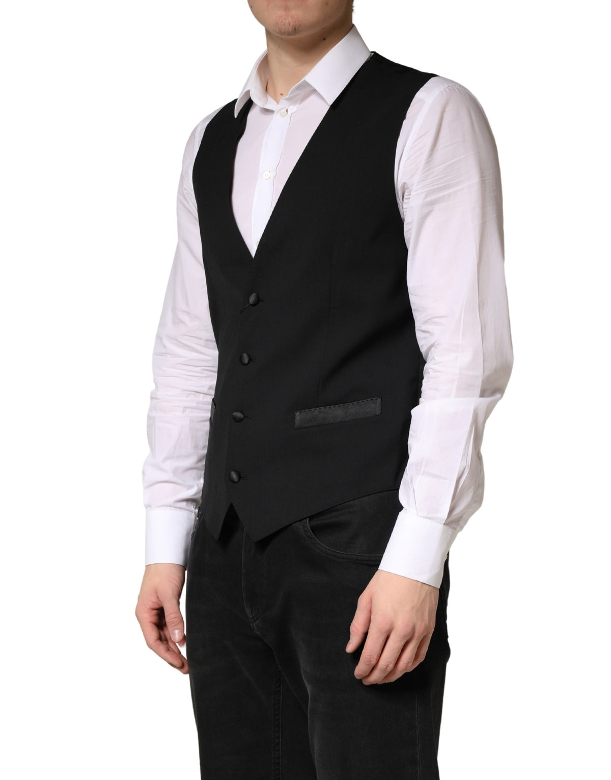 Elevate your wardrobe with the Dolce & Gabbana Black Wool Dress Men Formal Waistcoat Vest, a masterful blend of luxurious fabrics and Italian craftsmanship, perfect for the discerning individual.