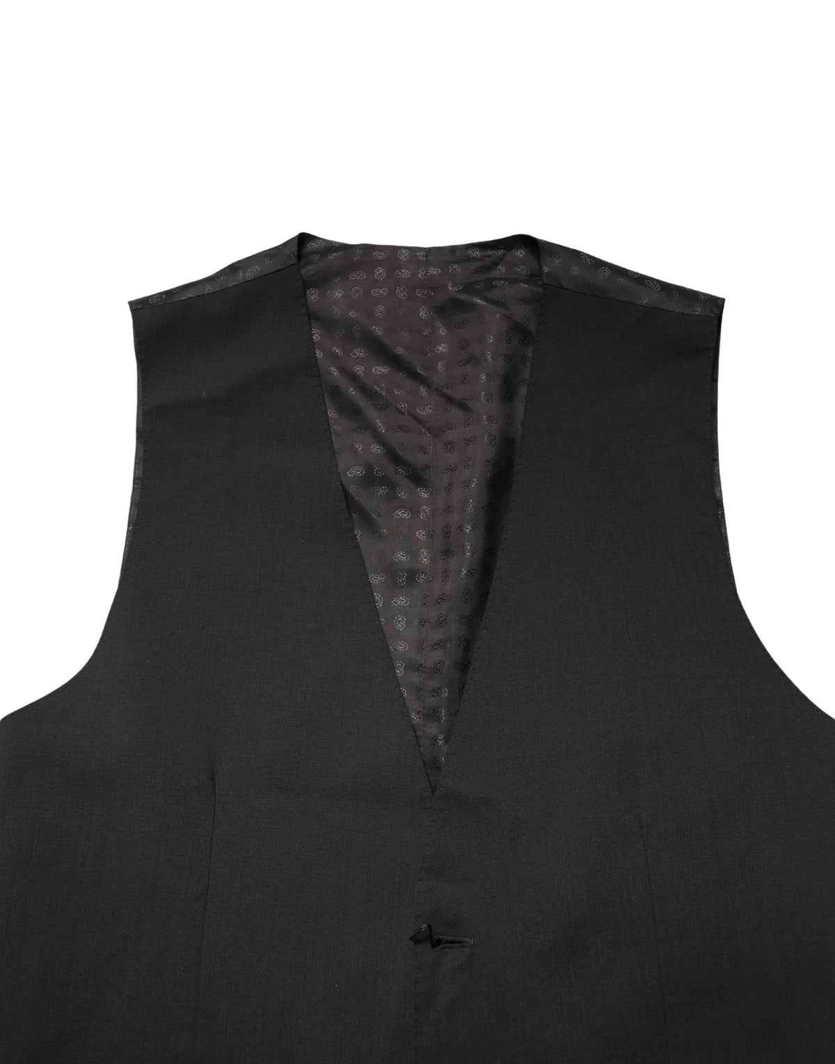 Elevate your wardrobe with the Dolce & Gabbana Black Wool Dress Waistcoat, a masterpiece of Italian craftsmanship, blending luxurious materials for timeless sophistication.