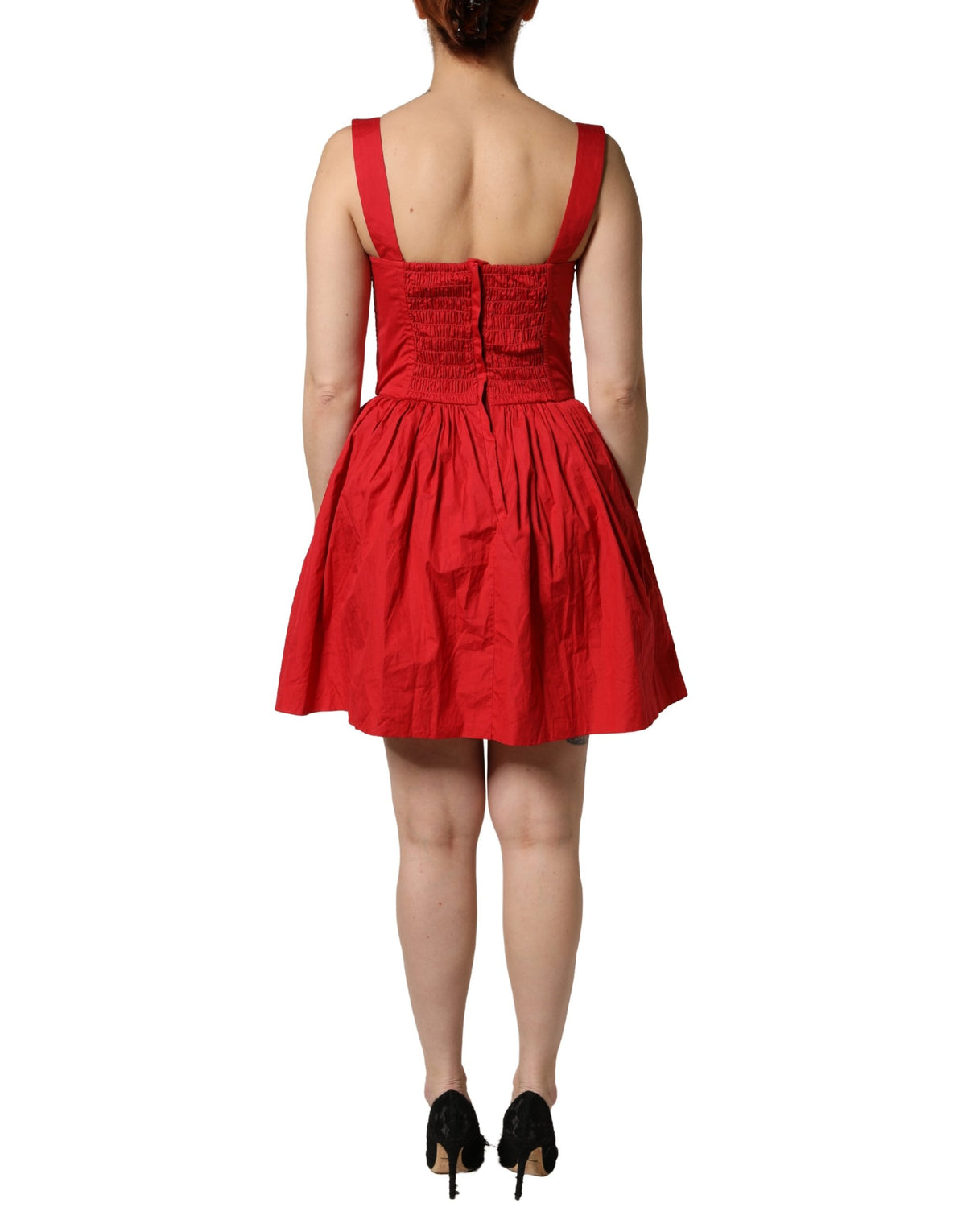 Indulge in the allure of the Dolce & Gabbana Red Cotton A-Line Sleeveless Mini Dress, a masterpiece of Italian craftsmanship that embodies refined luxury and sophistication.